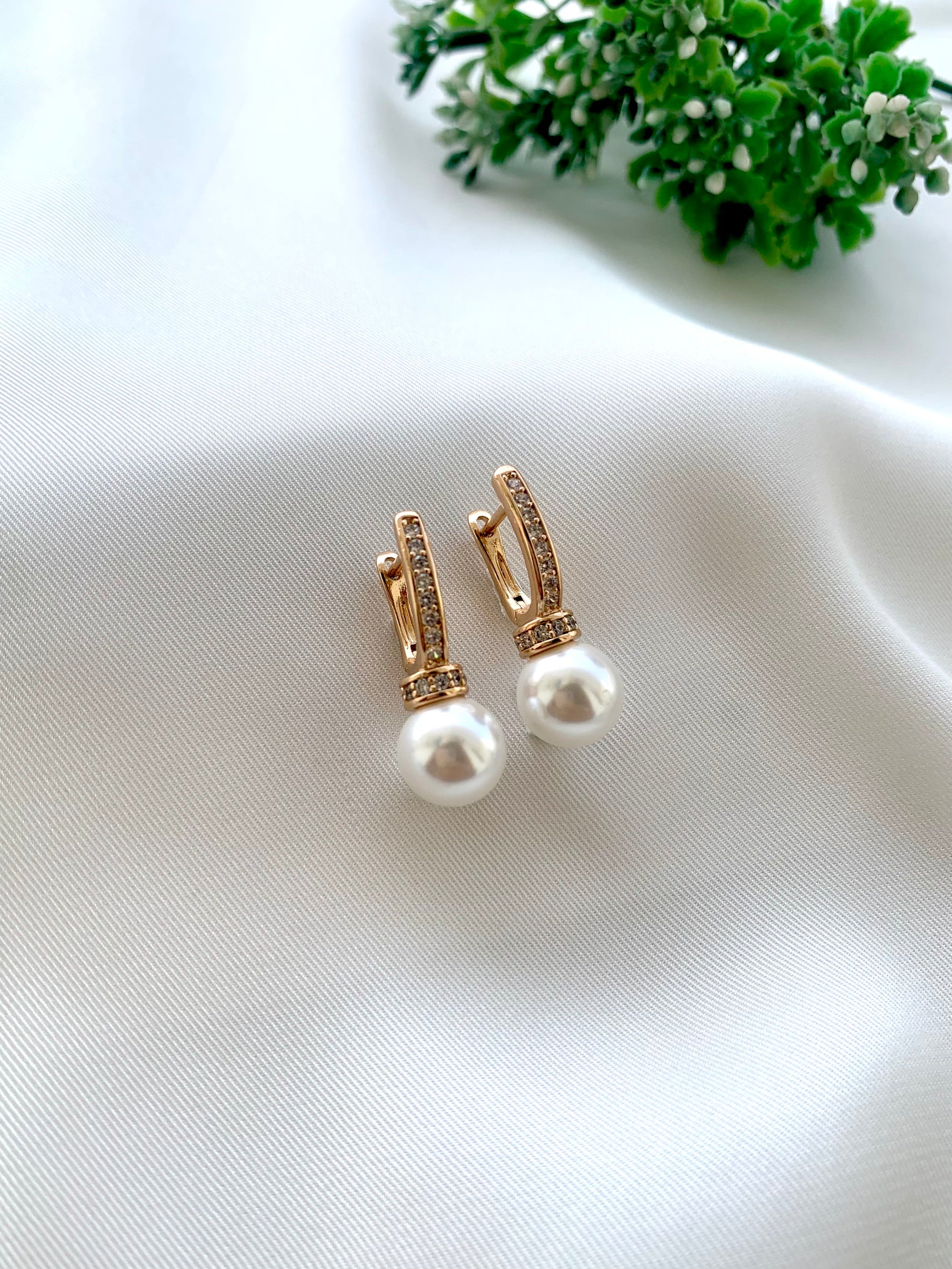Renu rose gold plated studs with American diamonds and pearl accents