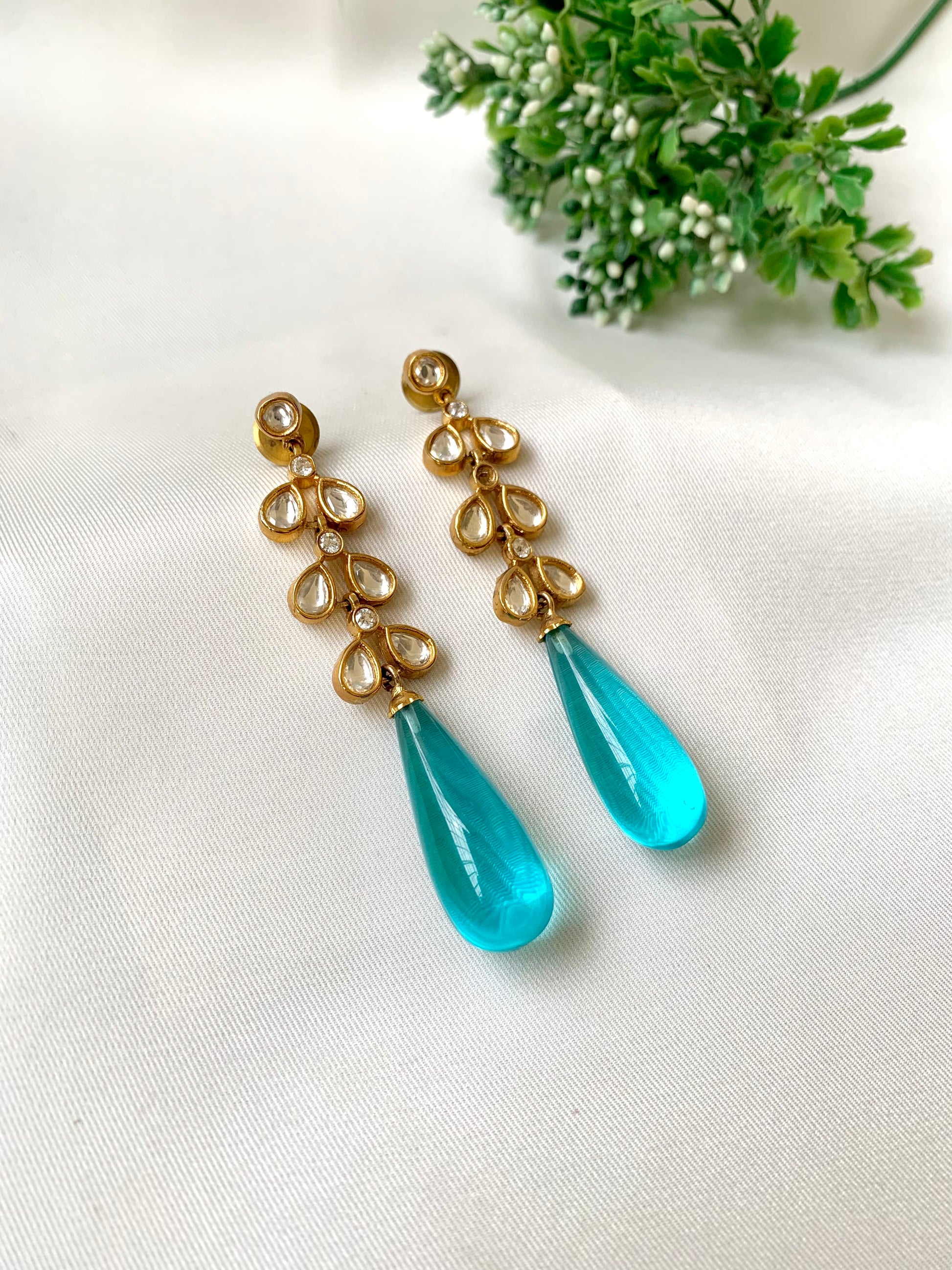 Hand crafted Rumi ferozi earrings featuring American Diamonds and semi-precious Polki Kundan stones