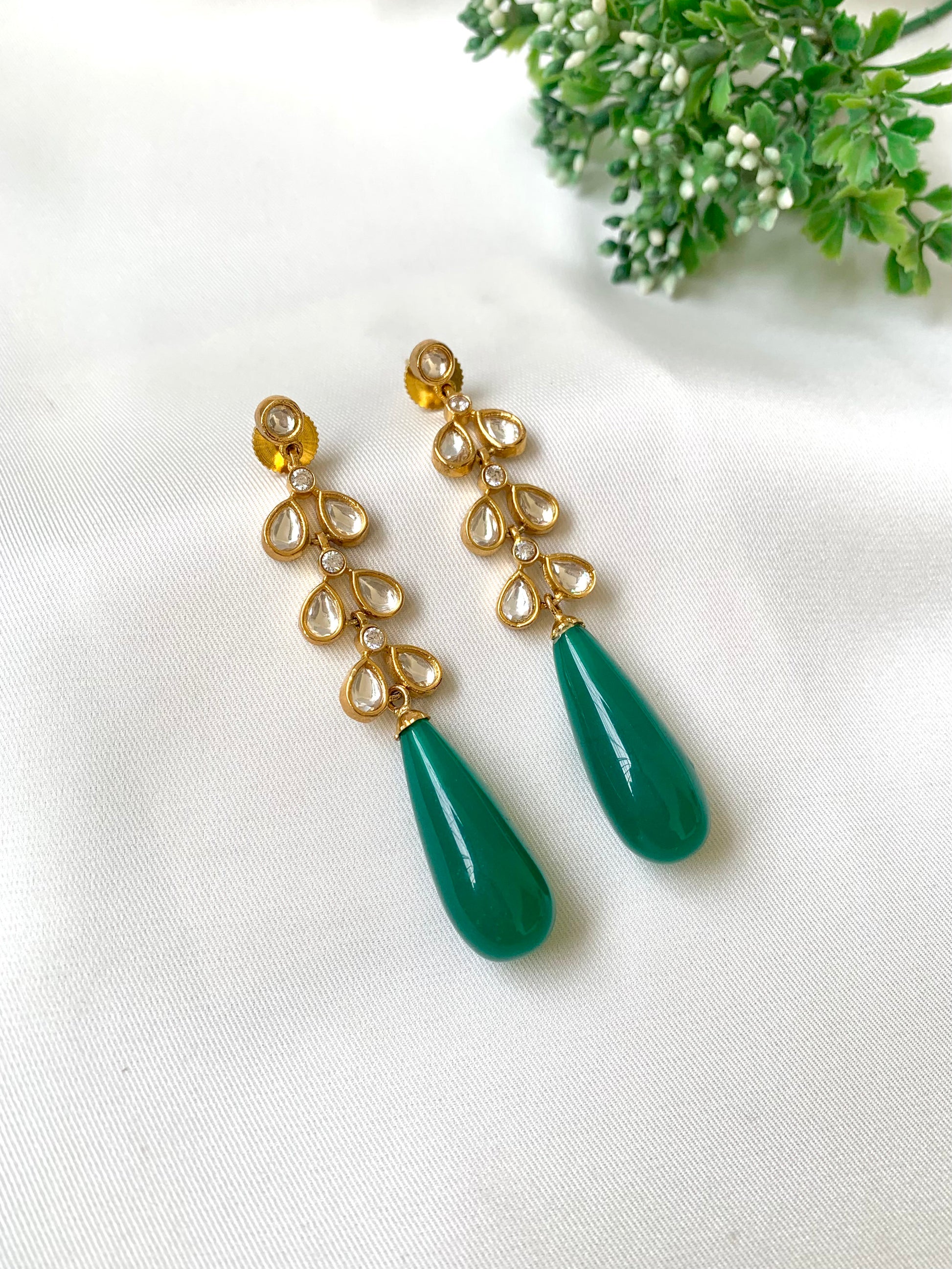 Hand crafted Rumi light green earrings featuring American Diamonds and semi-precious Polki Kundan stones