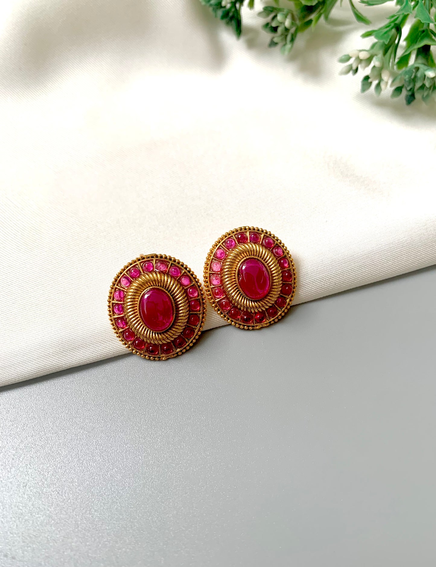 Round temple-style studs with red ruby and kemp stone detailing – Zamal Jewels