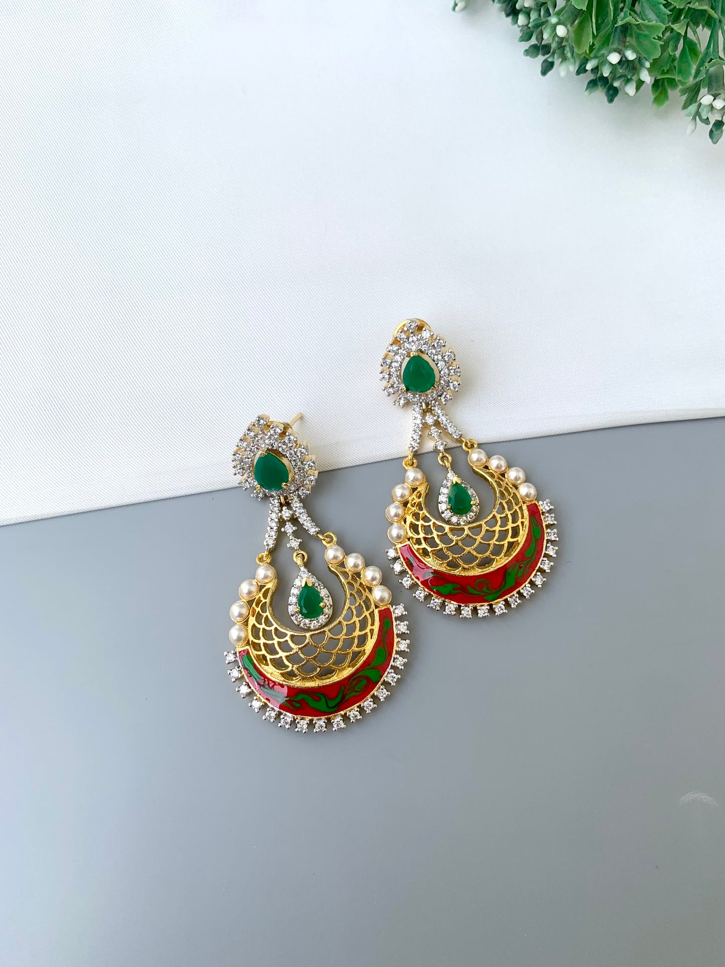 Saba gold plated earrings with pearls American diamonds emerald and hand painted meena work