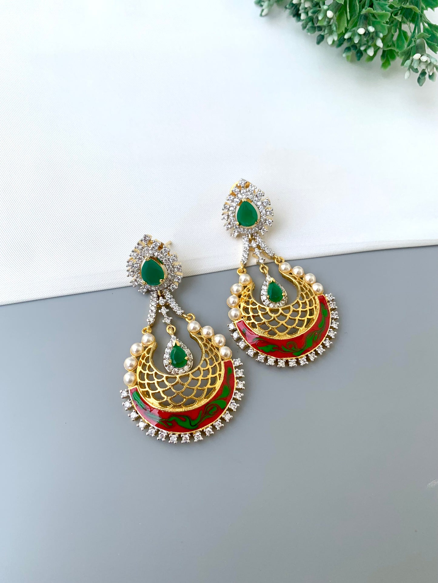 Saba gold plated earrings with pearls American diamonds emerald and hand painted meena work