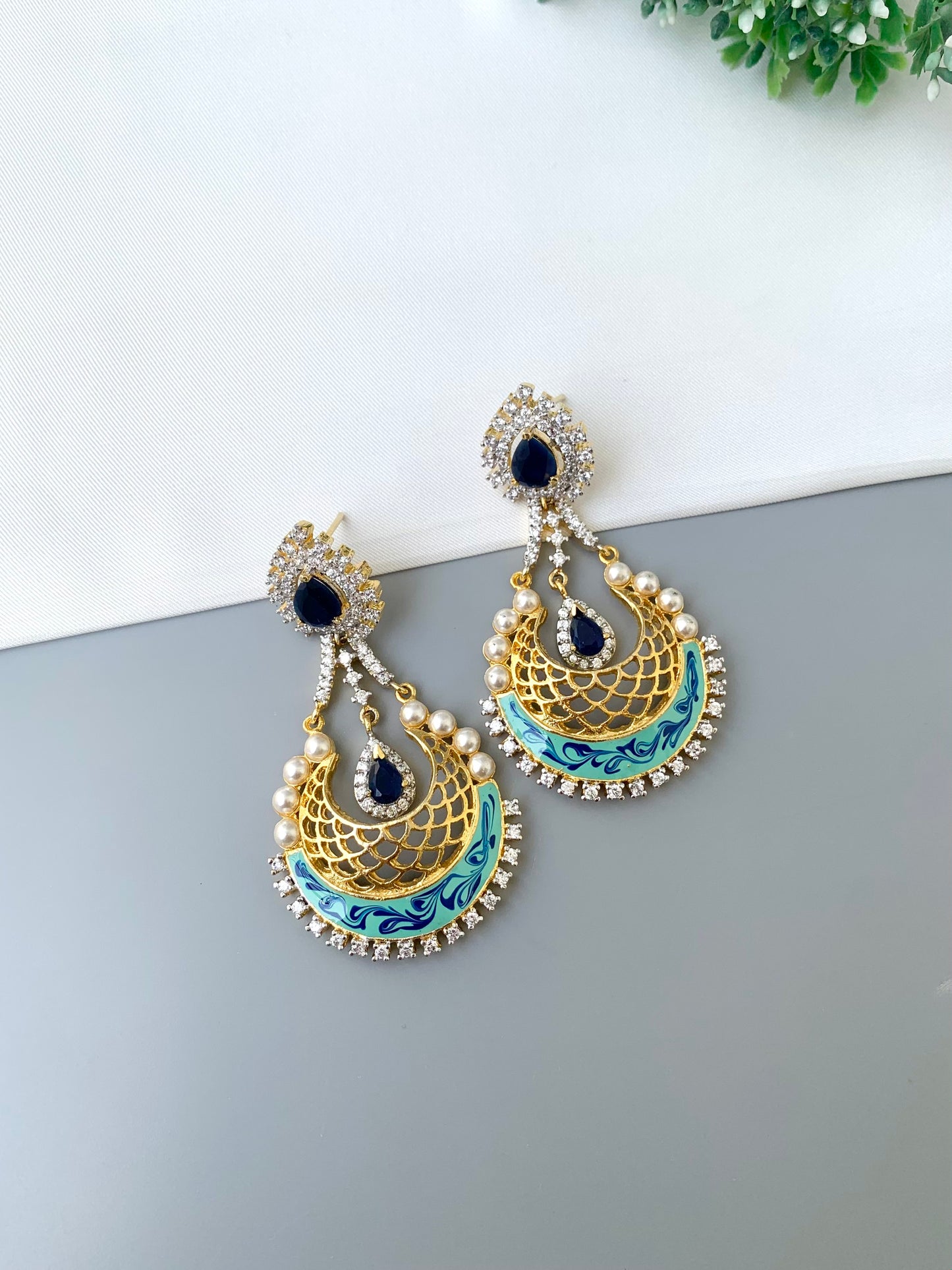 Saba gold plated earrings with pearls American diamonds sapphire and hand painted meena work