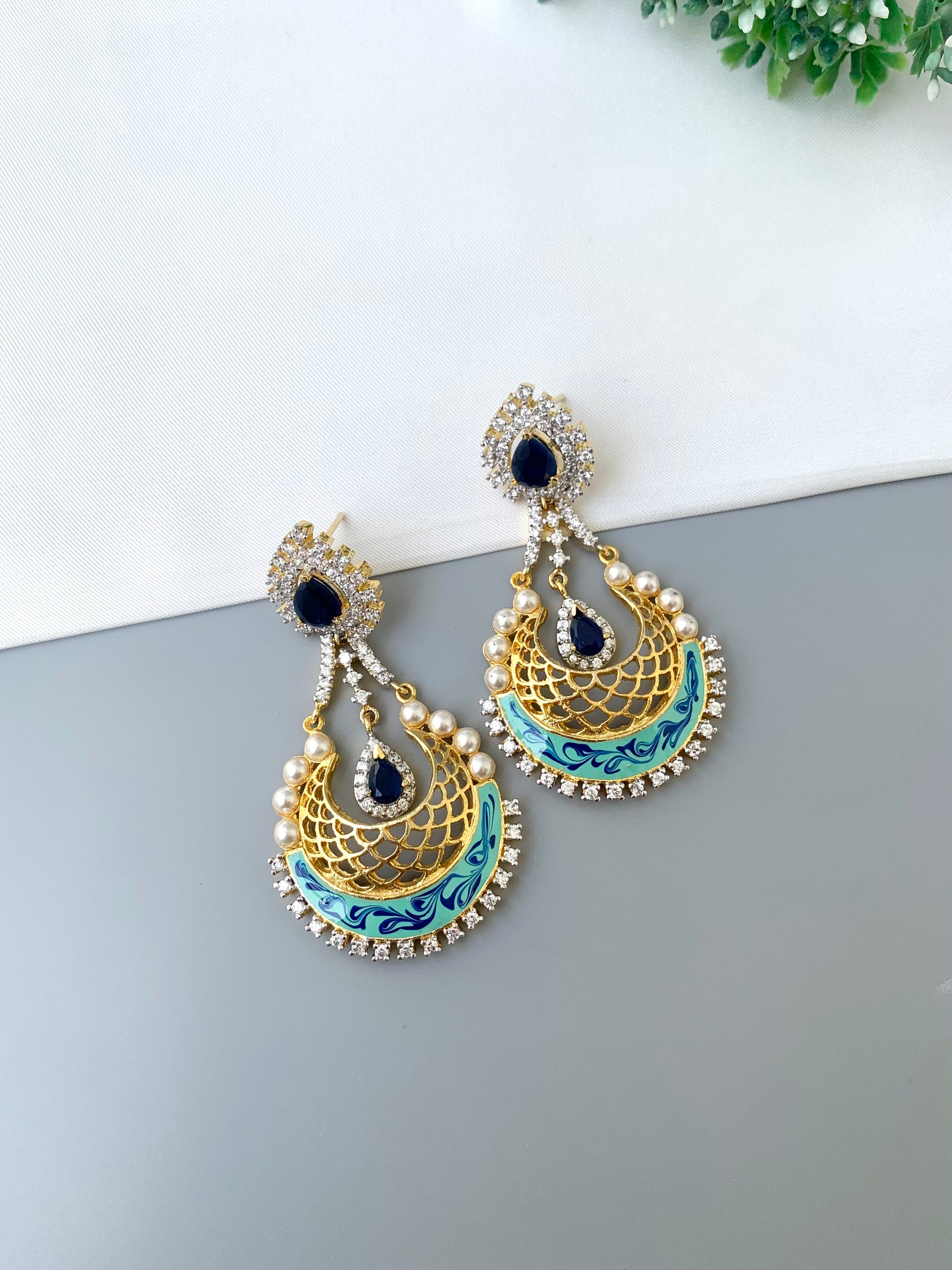Saba gold plated earrings with pearls American diamonds sapphire and hand painted meena work