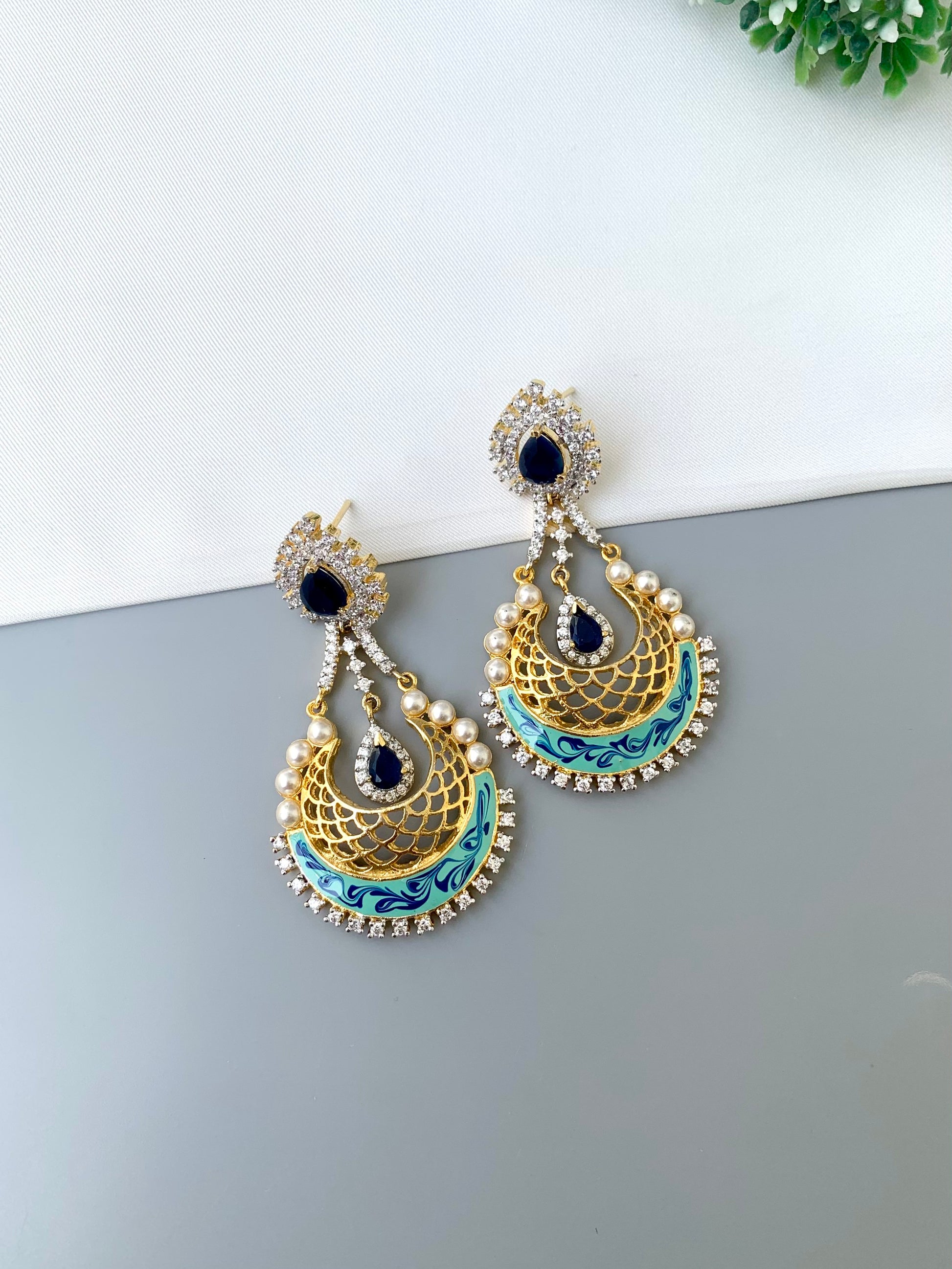 Saba gold plated earrings with pearls American diamonds sapphire and hand painted meena work