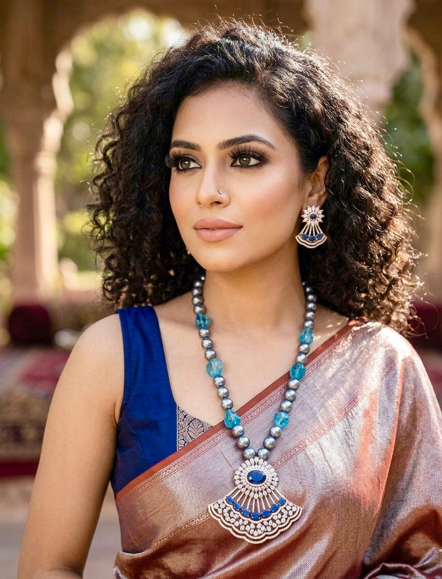 Saera sapphire maala set in black rose gold plating with American diamonds and pearls