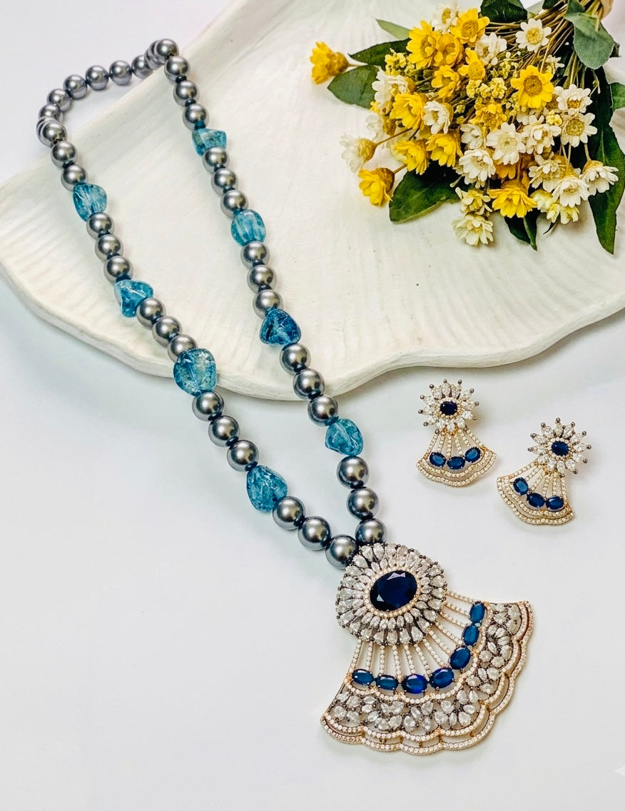 Saera sapphire maala set in black rose gold plating with American diamonds and pearls