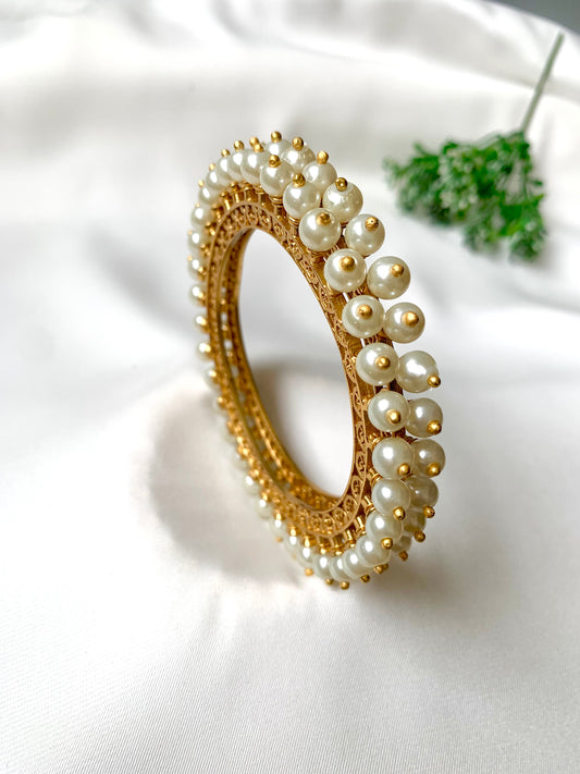 Pair of handcrafted 22kt gold plated bangles with hand filigree work and semi-precious pearls, size 2.6