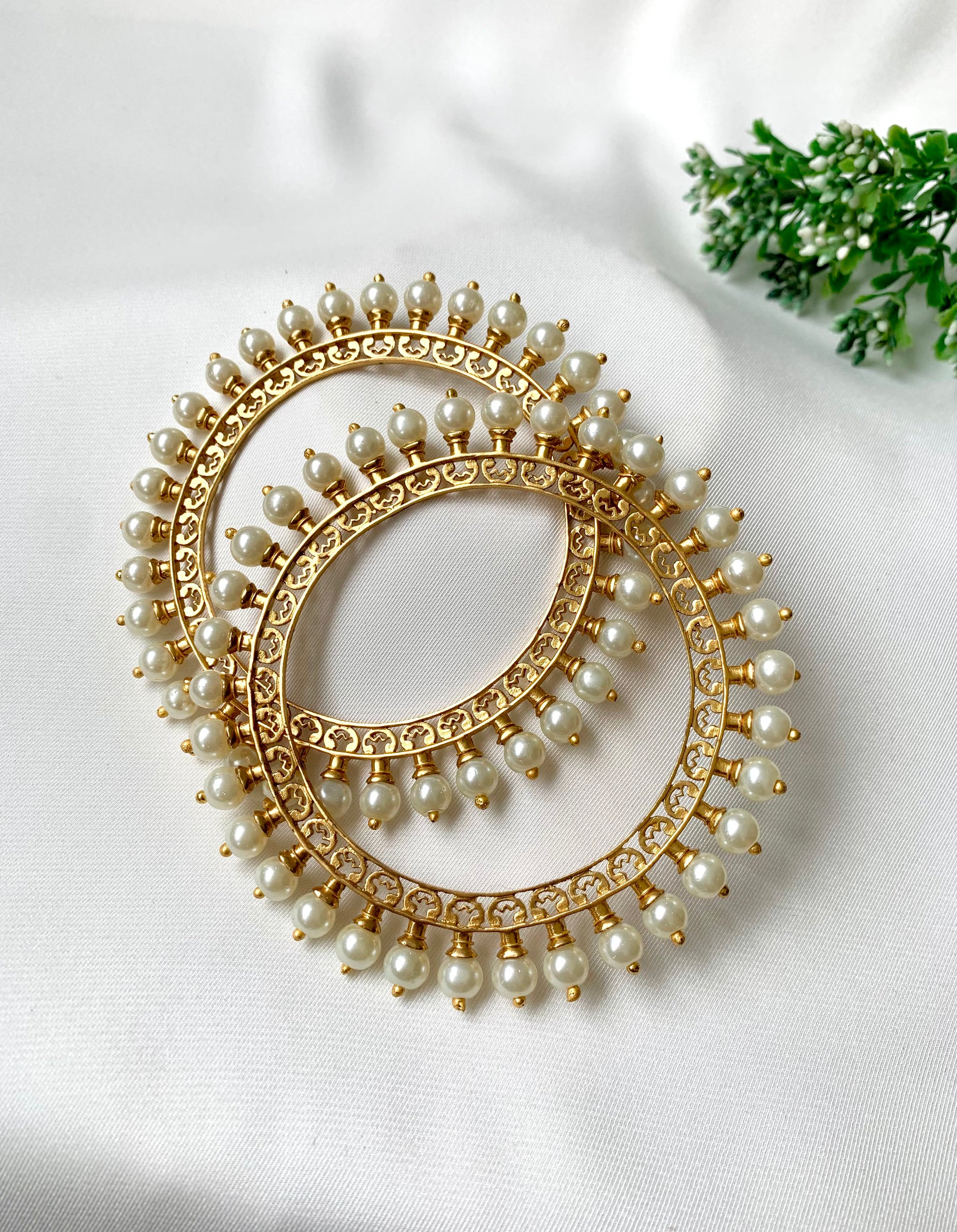 Pair of handcrafted 22kt gold plated bangles with hand filigree work and semi-precious pearls, size 2.6