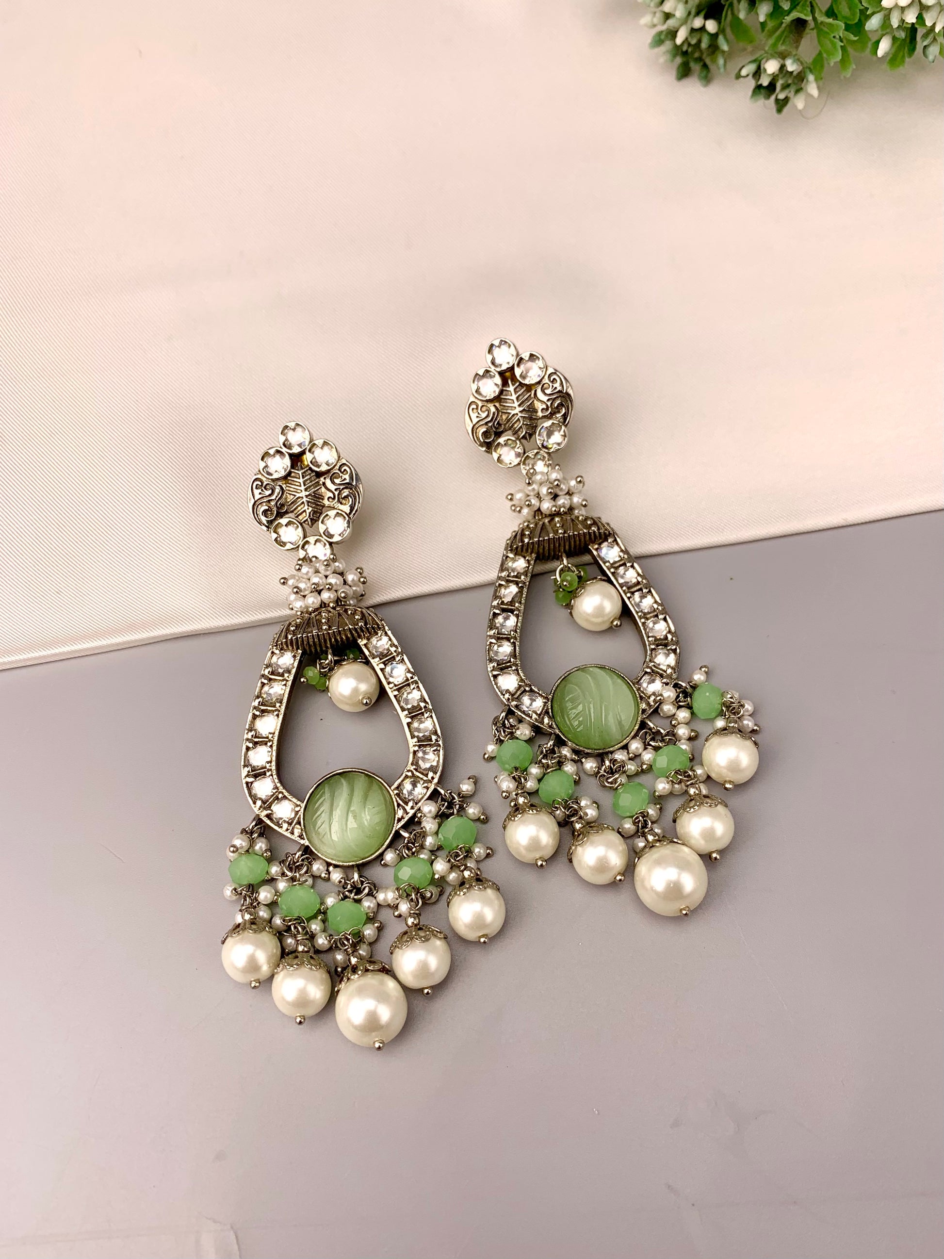 Saliha rhodium plated earrings with American diamonds hand carved onyx and semi precious pearls