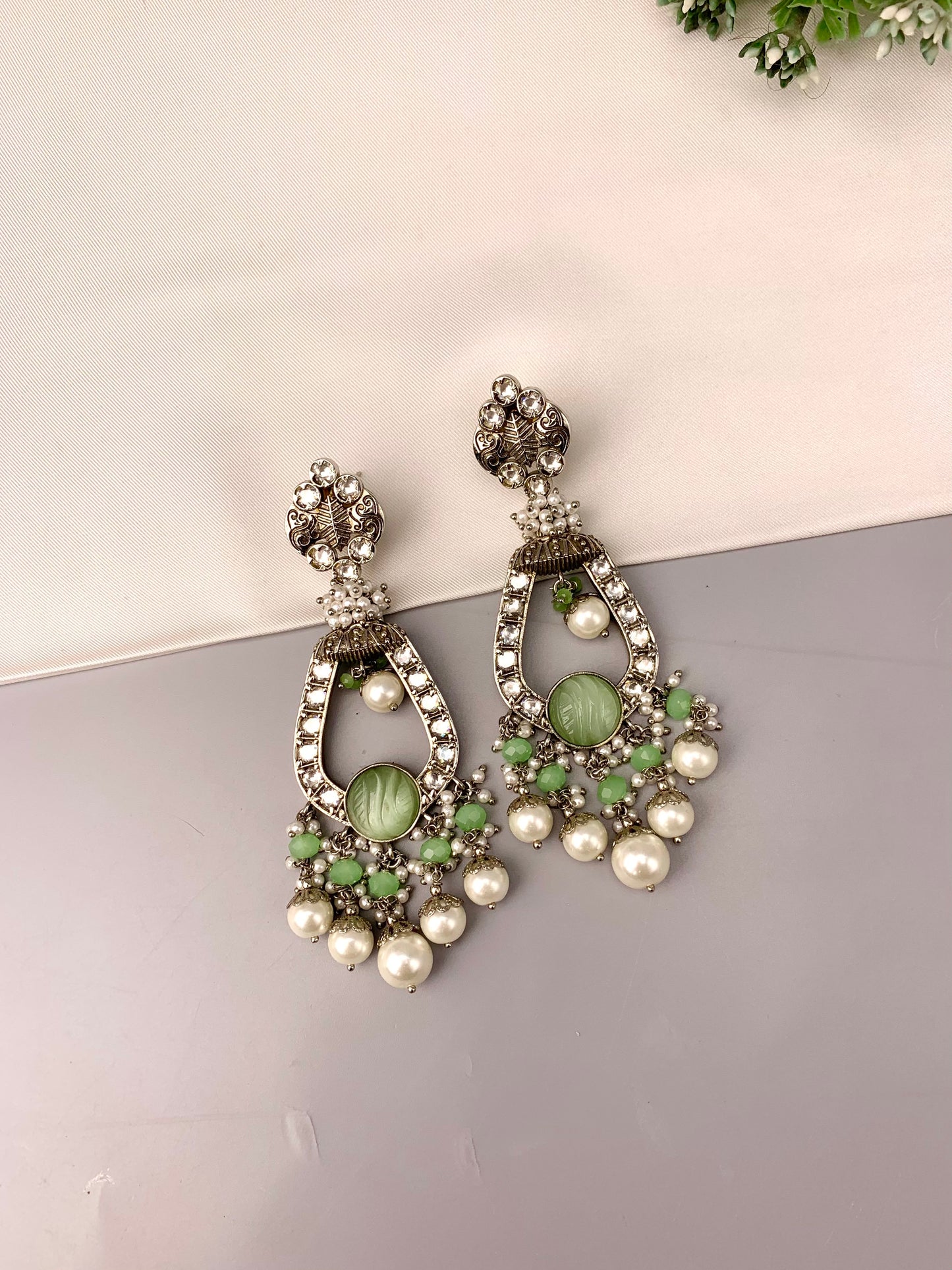 Saliha rhodium plated earrings with American diamonds hand carved onyx and semi precious pearls