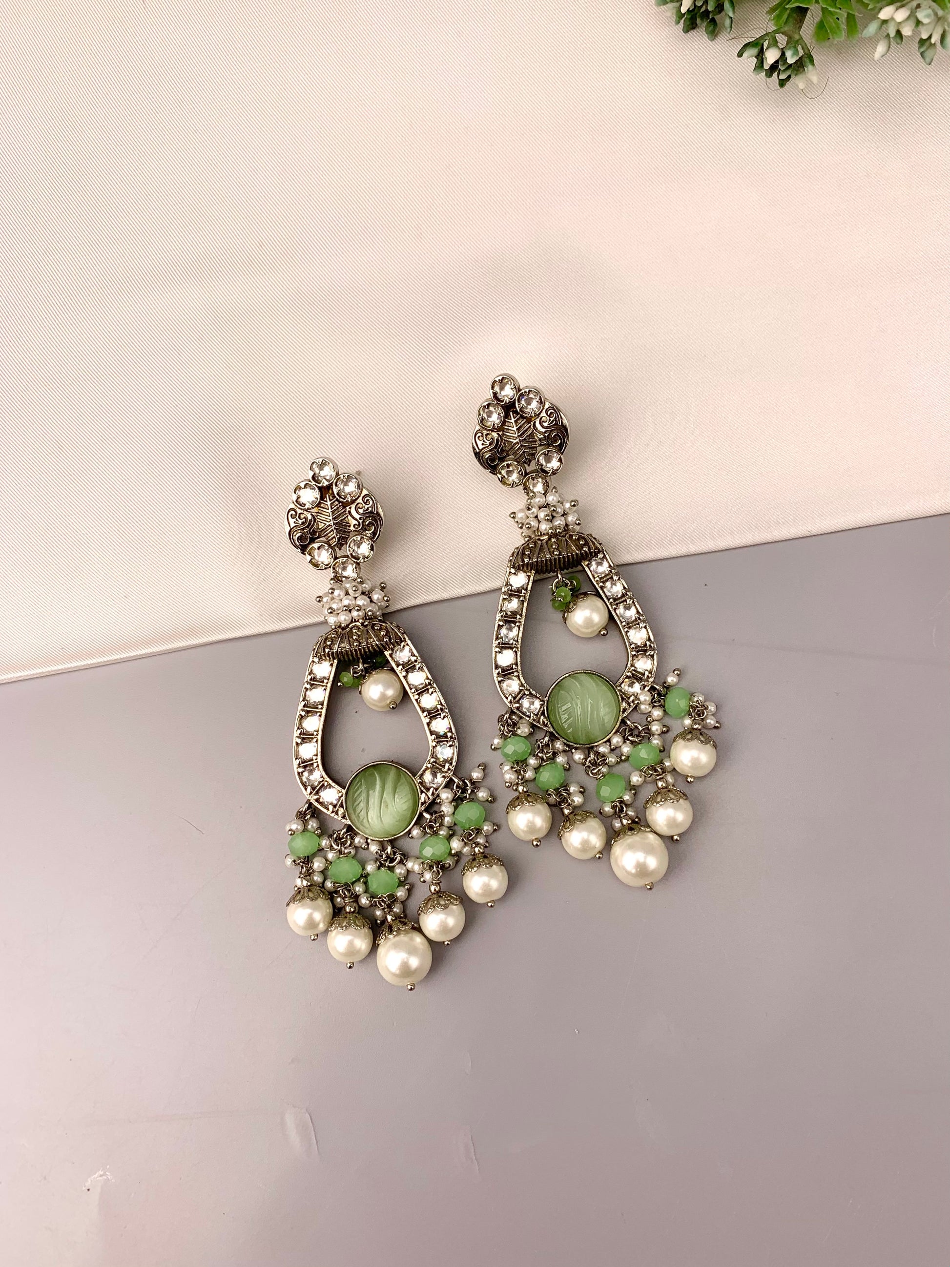 Saliha rhodium plated earrings with American diamonds hand carved onyx and semi precious pearls