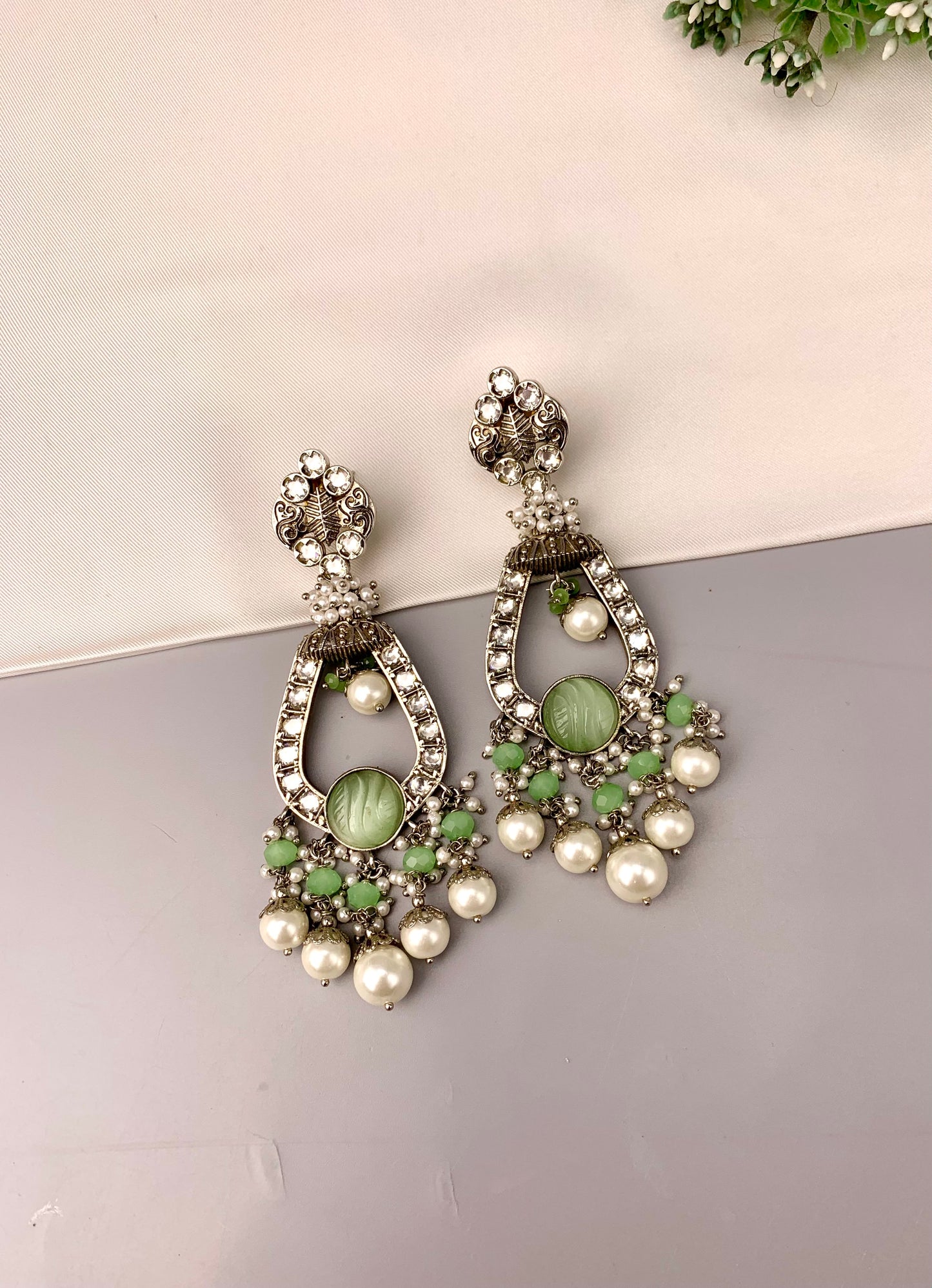 Saliha rhodium plated earrings with American diamonds hand carved onyx and semi precious pearls