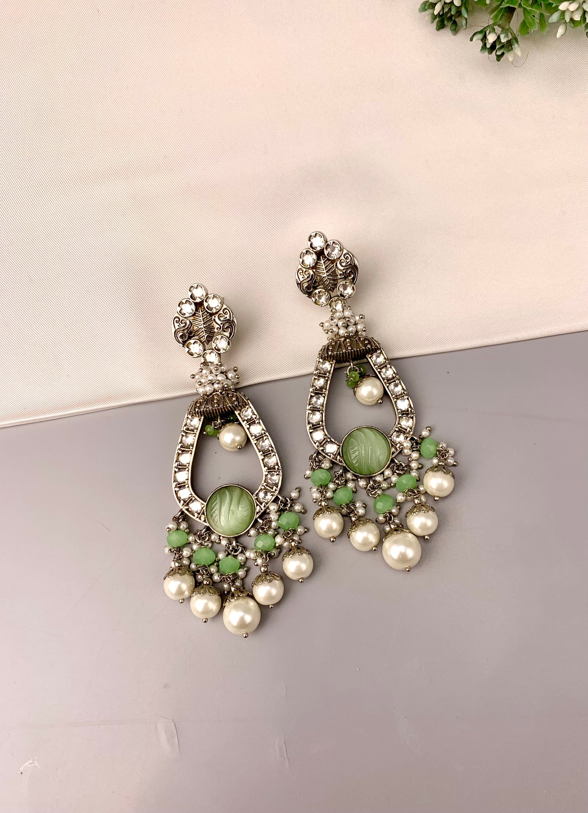 Saliha rhodium plated earrings with American diamonds hand carved onyx and semi precious pearls