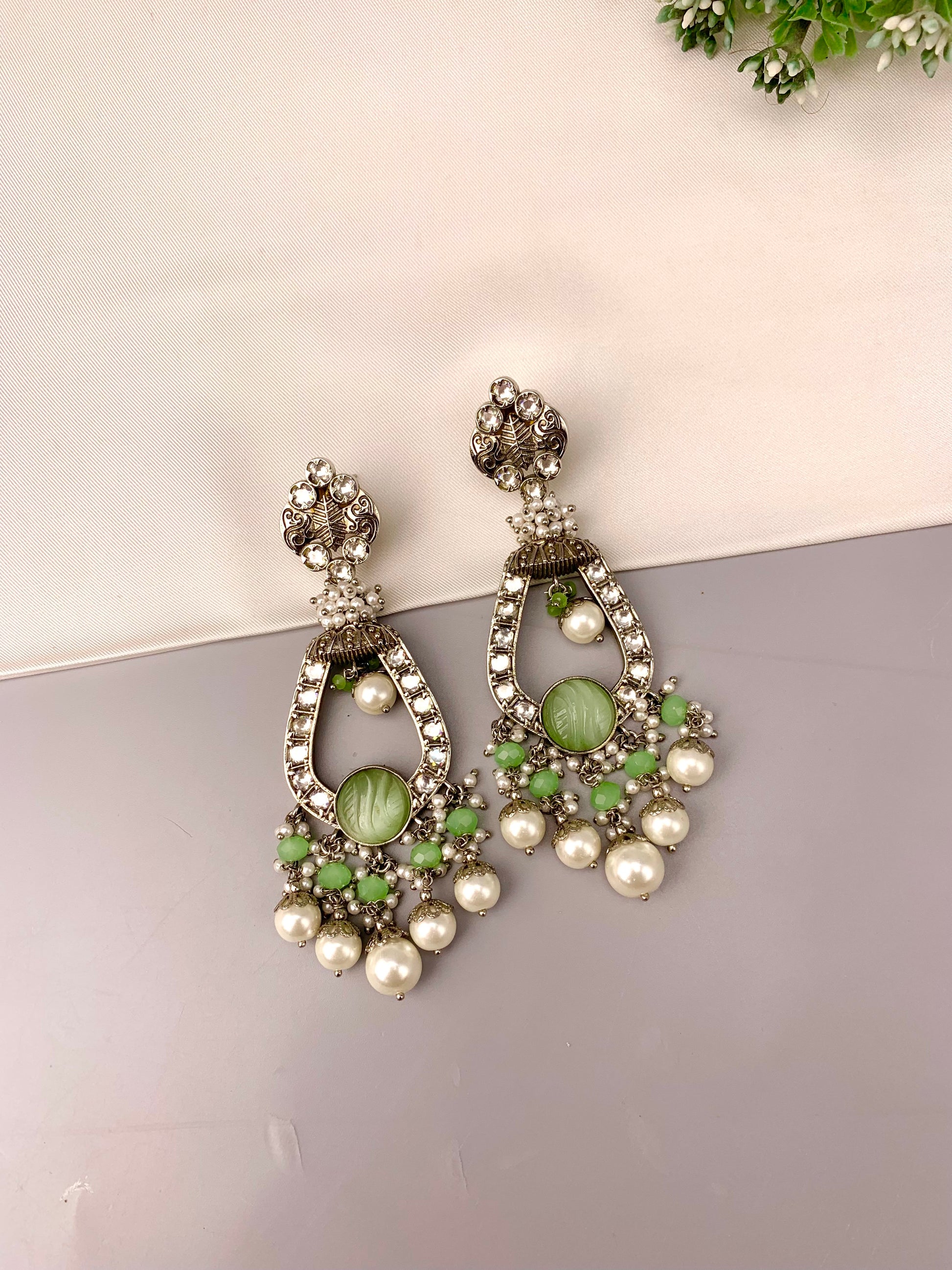Saliha rhodium plated earrings with American diamonds hand carved onyx and semi precious pearls