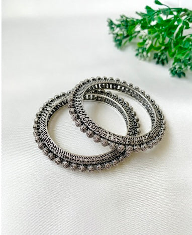 Sasha rhodium plated bangles with oxidized finish and American diamonds in stackable design