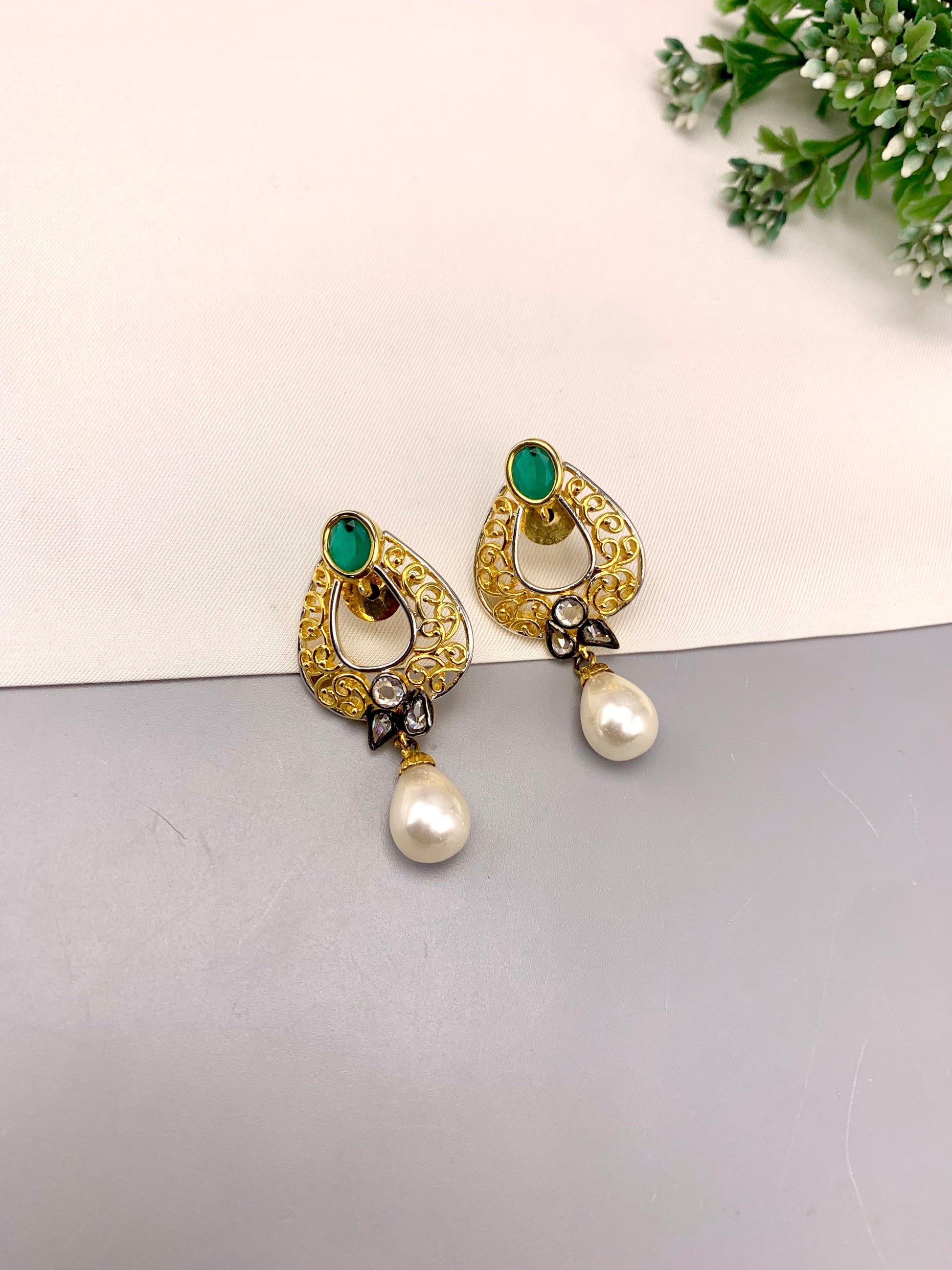 Savi handcrafted 22kt gold plated oxidized earrings with American Diamonds, semi-precious Emeralds and Pearls