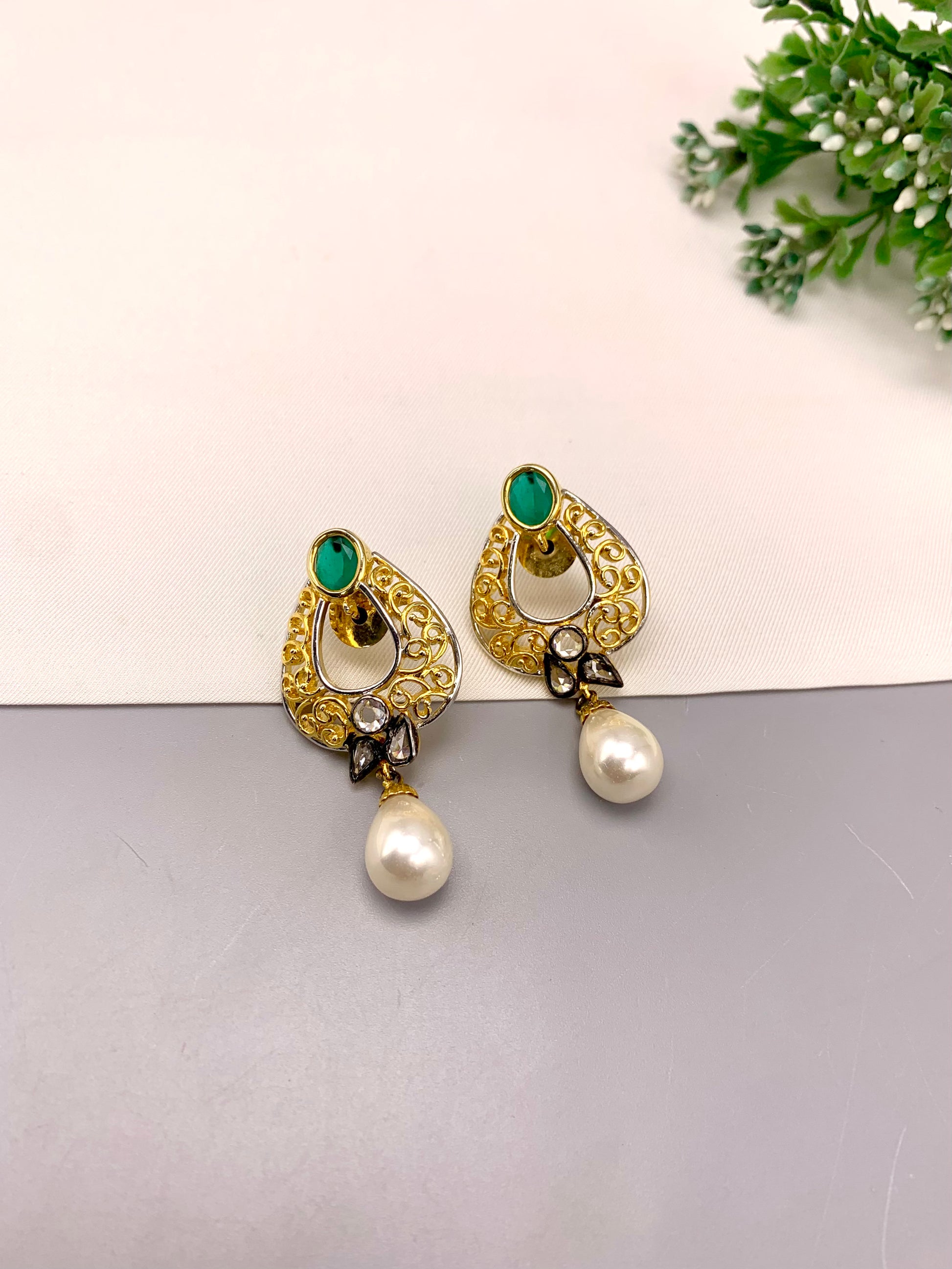 Savi handcrafted 22kt gold plated oxidized earrings with American Diamonds, semi-precious Emeralds and Pearls