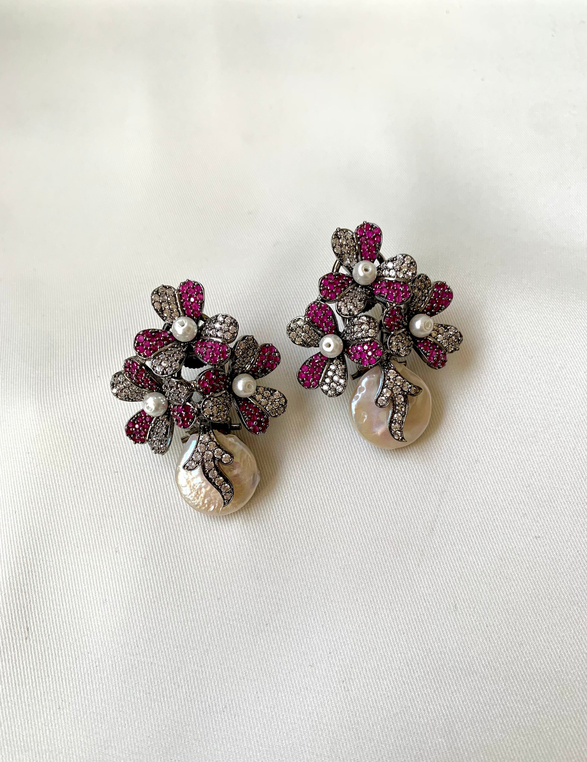 Sayyah handcrafted rhodium oxidized signature earrings with baroque pearls and ruby Swarovski crystals