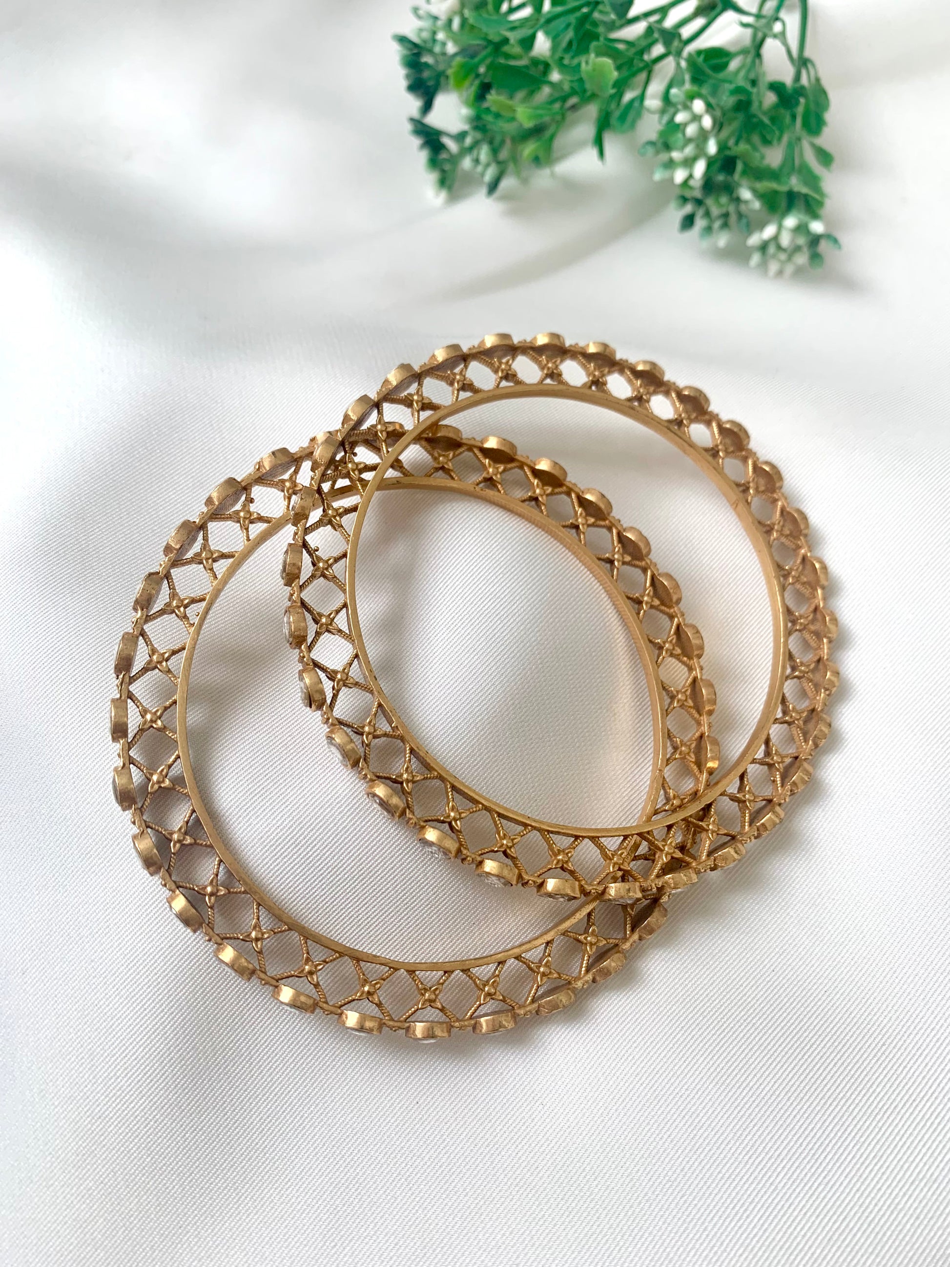 Serene handcrafted 22kt matte gold plated bangles with high quality Polki Kundan, sold as a pair