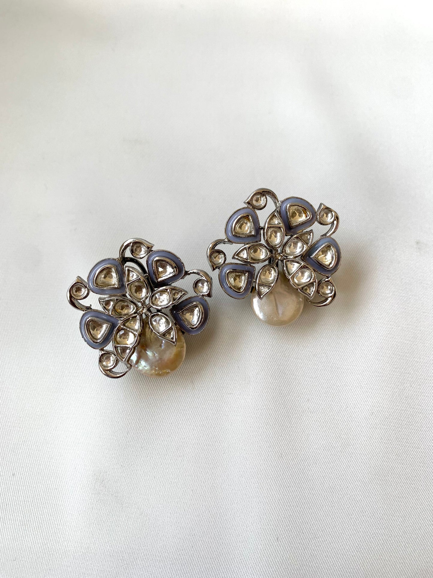 Serwa Grey rhodium plated signature studs with baroque pearls and polki kundan meena detailing