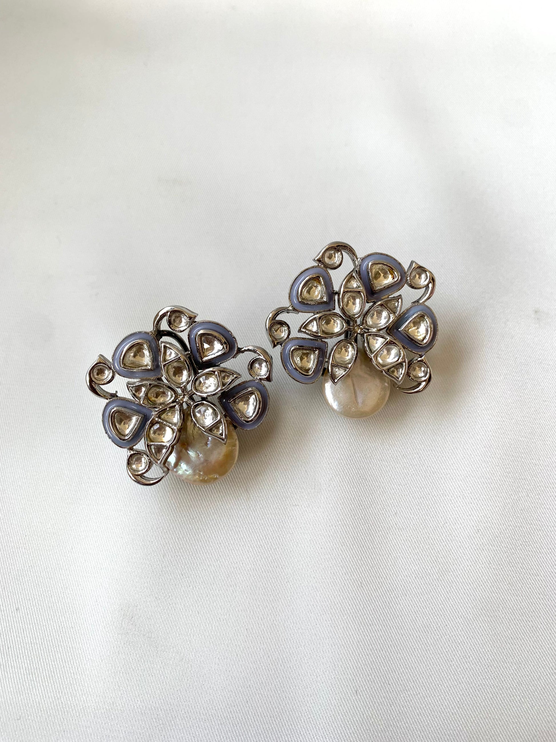 Serwa Grey rhodium plated signature studs with baroque pearls and polki kundan meena detailing