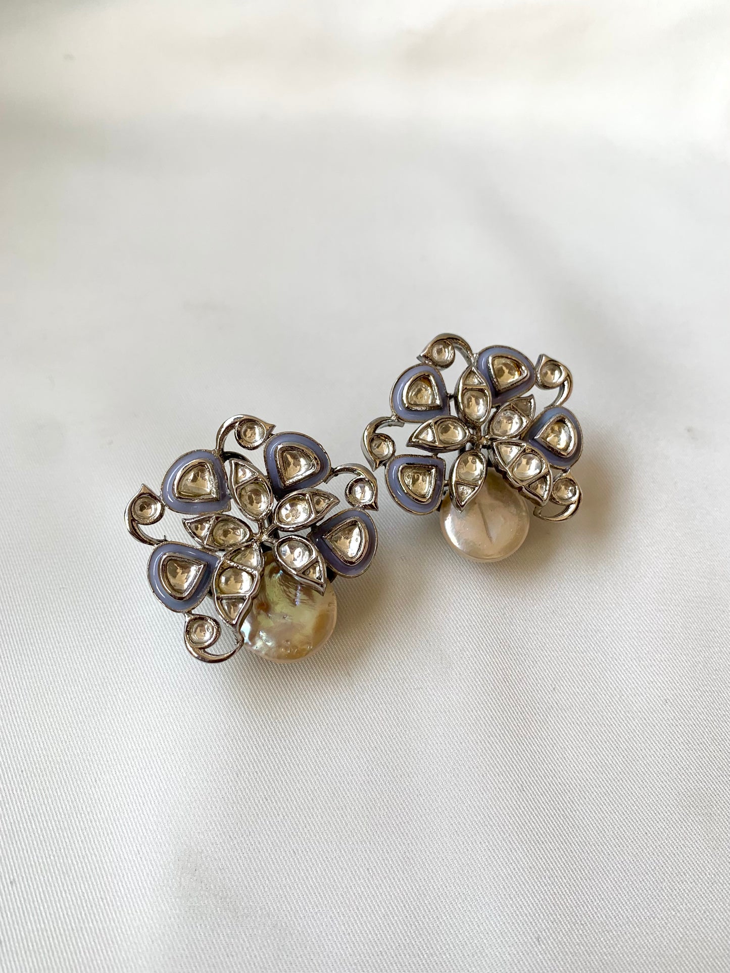 Serwa Grey rhodium plated signature studs with baroque pearls and polki kundan meena detailing