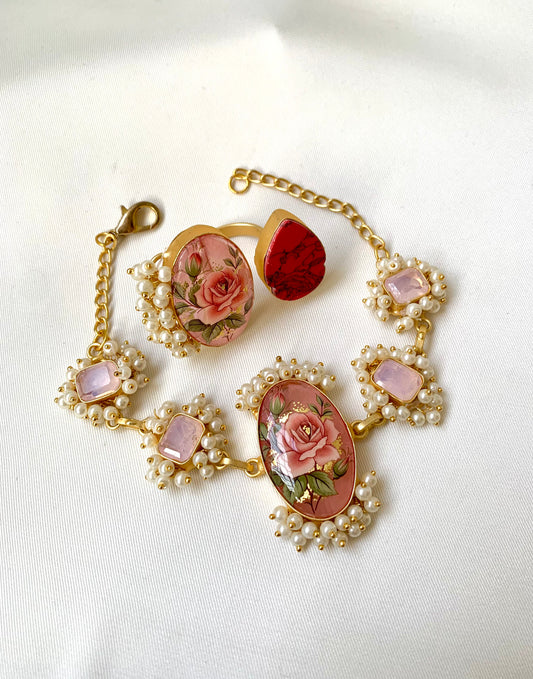 Shehnai Combo Set featuring handcrafted gold plated bracelet and adjustable ring with pearls, ruby and hand painted Tansa beads