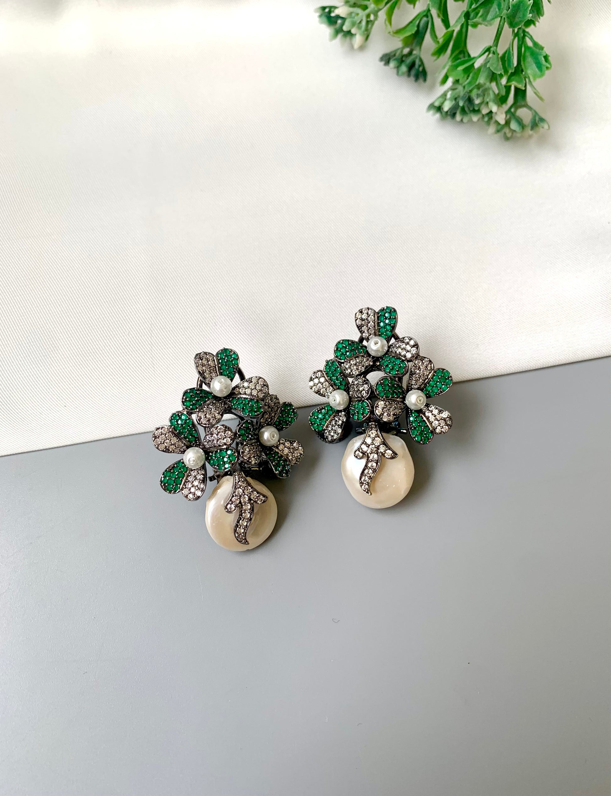 Sivah handcrafted rhodium oxidized signature earrings with baroque pearls and emerald Swarovski crystals
