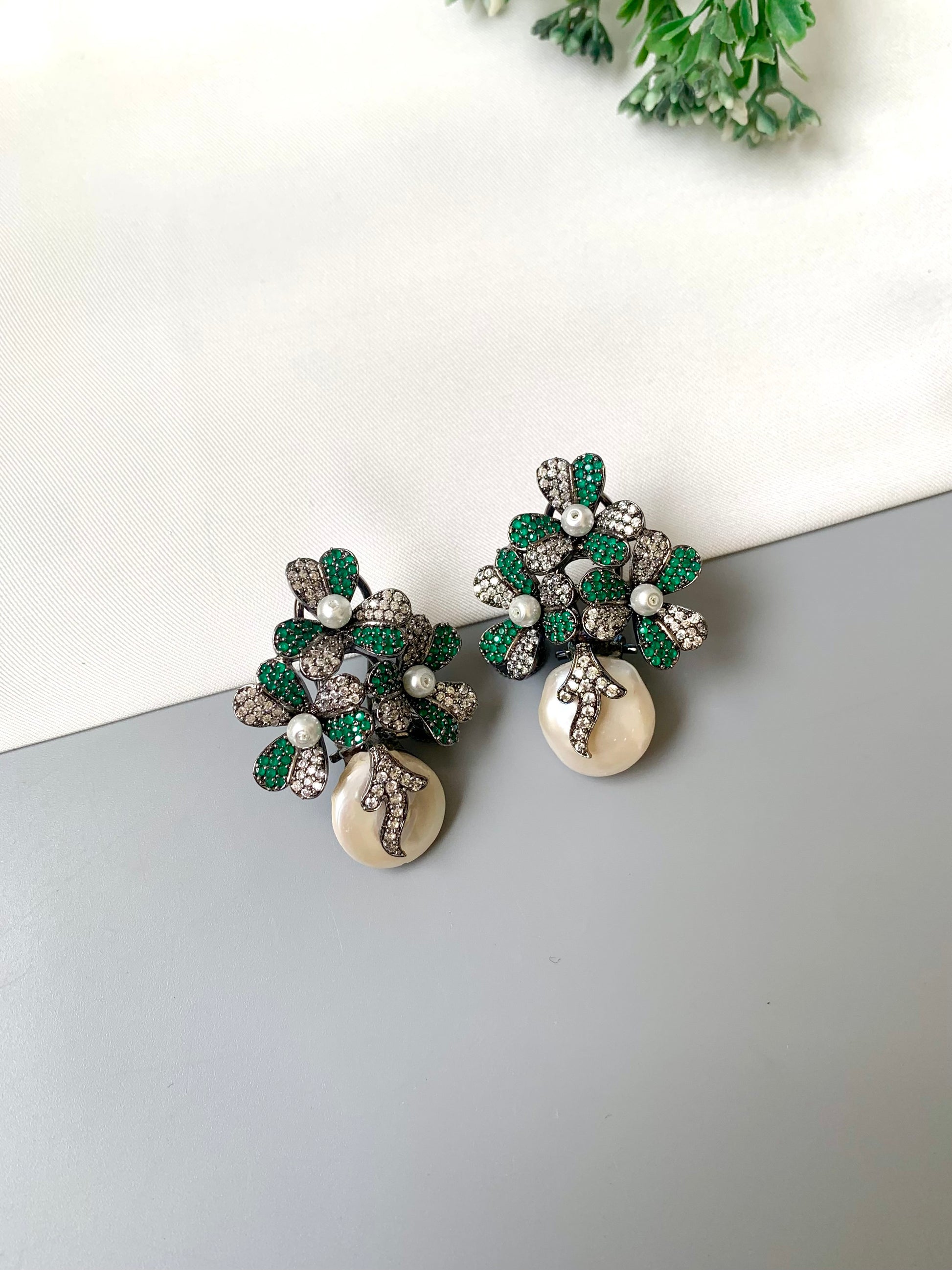 Sivah handcrafted rhodium oxidized signature earrings with baroque pearls and emerald Swarovski crystals