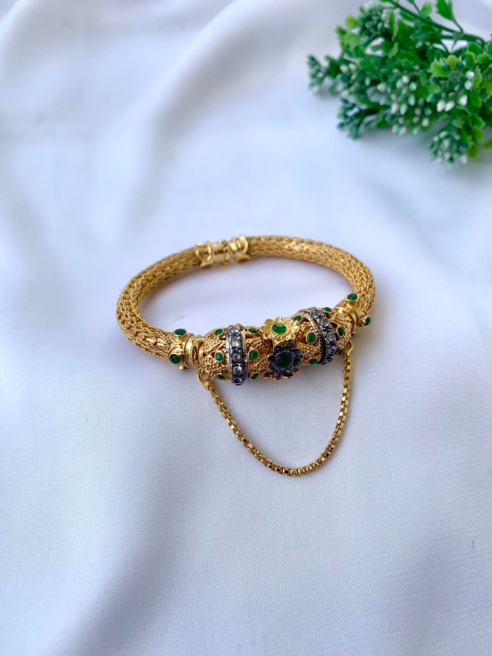 Sophiya gold plated openable chain bangle with American diamonds and emerald accents