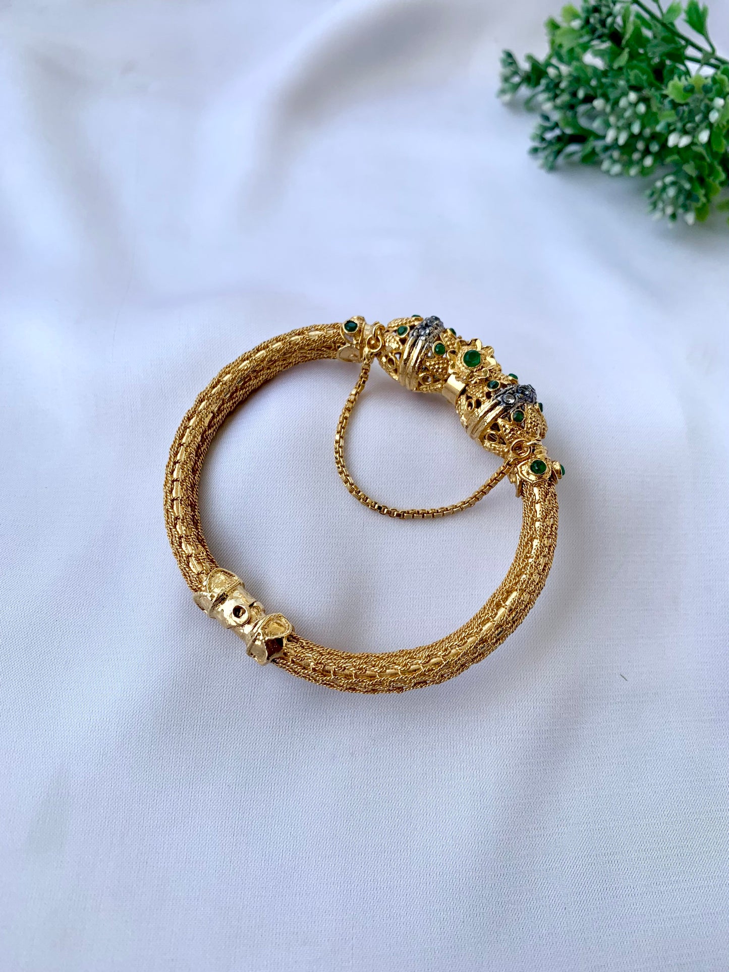 Sophiya gold plated openable chain bangle with American diamonds and emerald accents