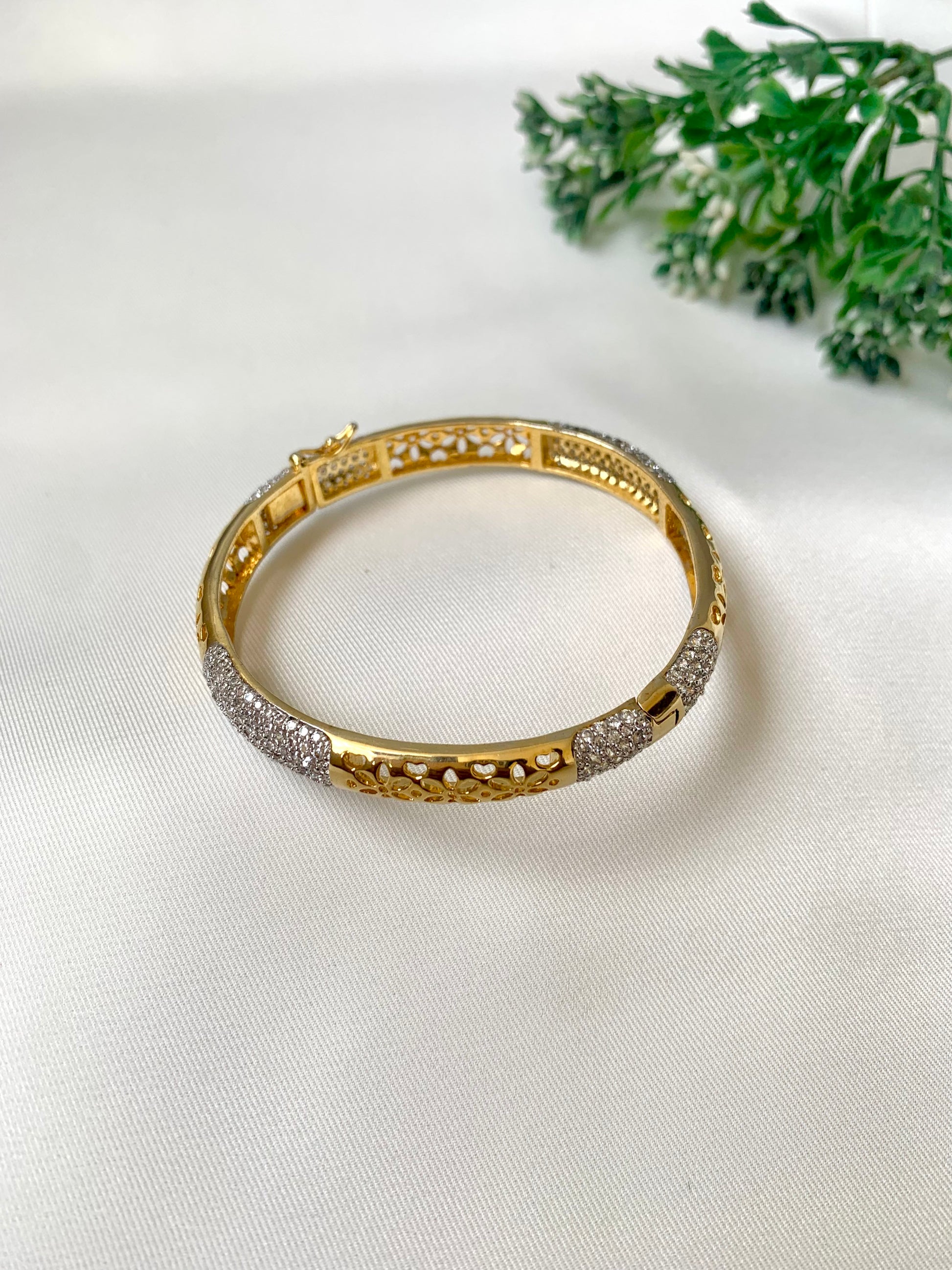 Suhana gold plated bangle with American diamonds and openable screw design