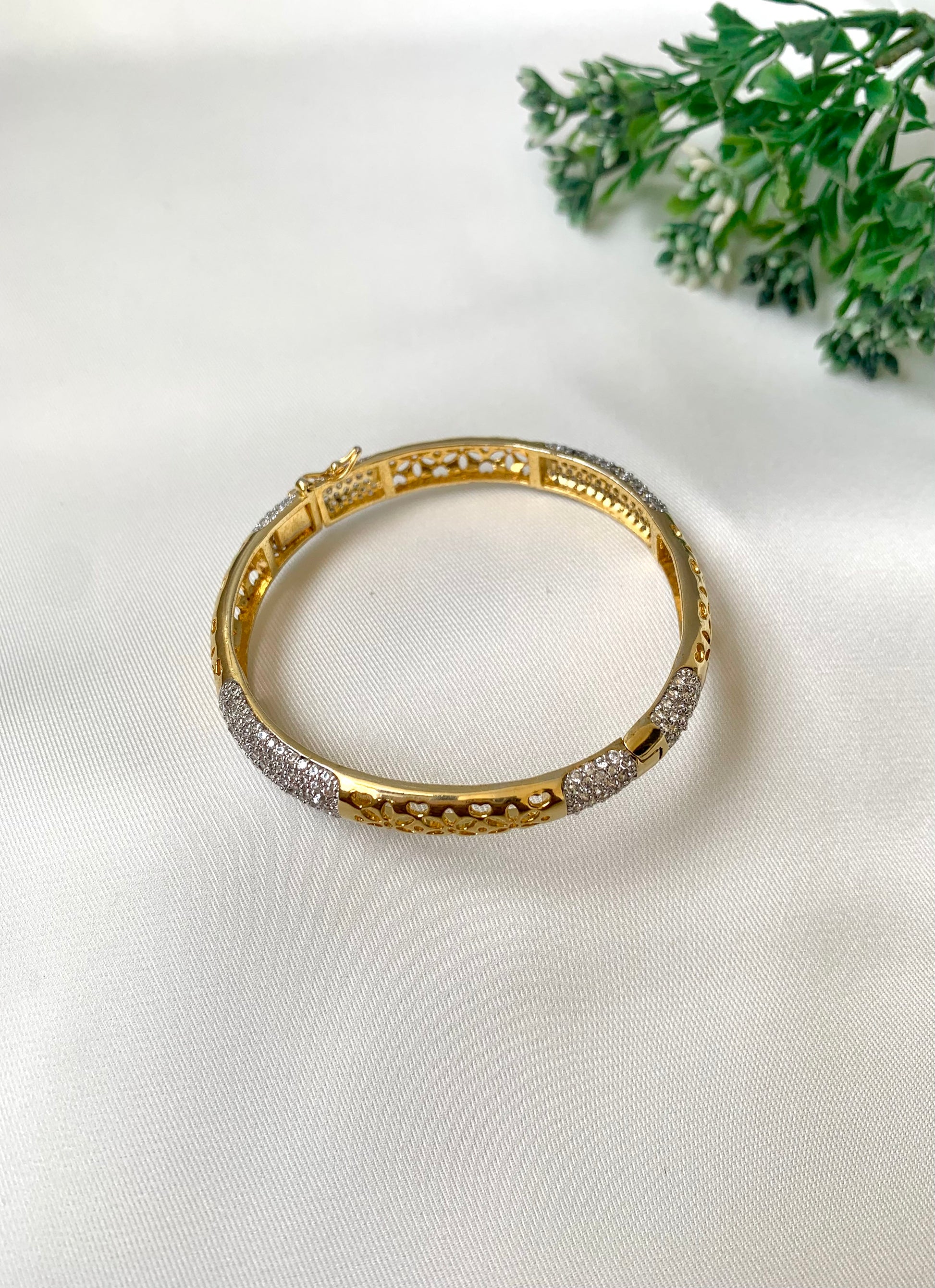 Suhana gold plated bangle with American diamonds and openable screw design