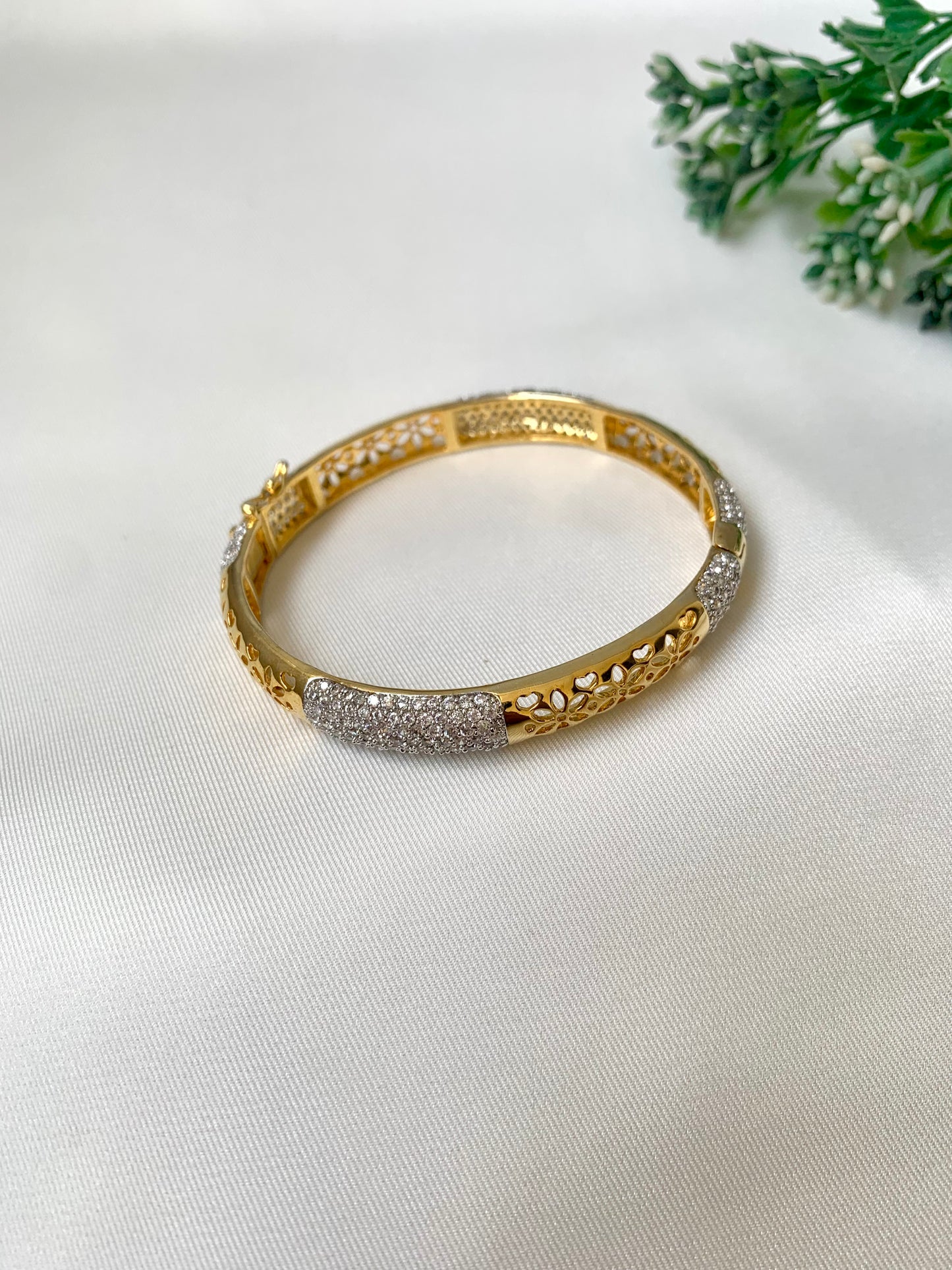 Suhana gold plated bangle with American diamonds and openable screw design