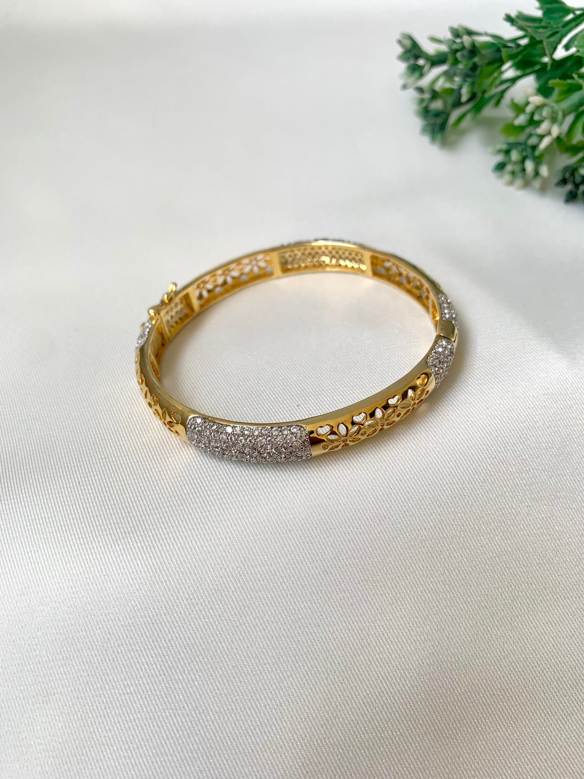 Suhana gold plated bangle with American diamonds and openable screw design