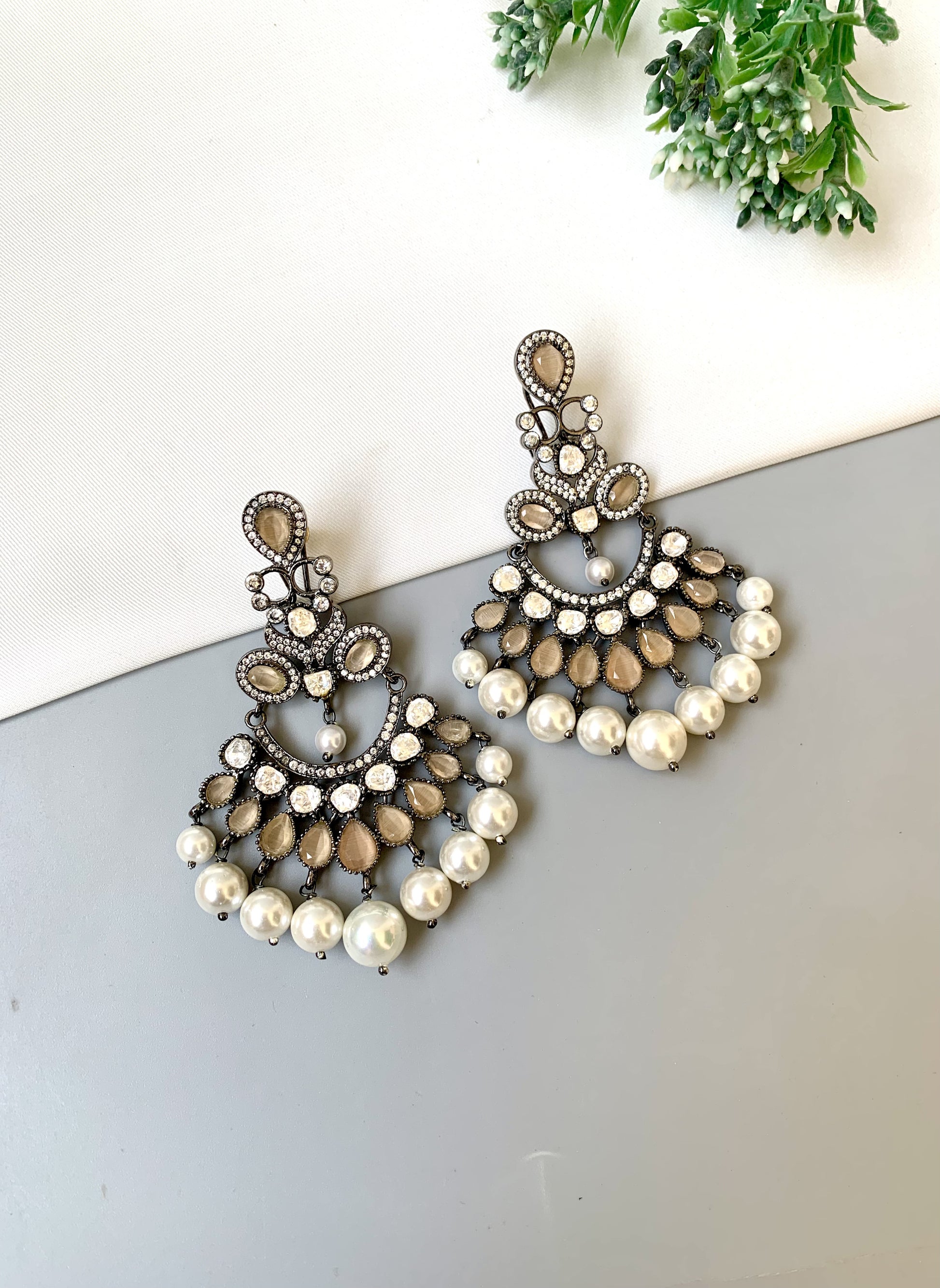 Suhani handcrafted signature earrings in rhodium oxidized finish with polki kundan, onyx and pearls