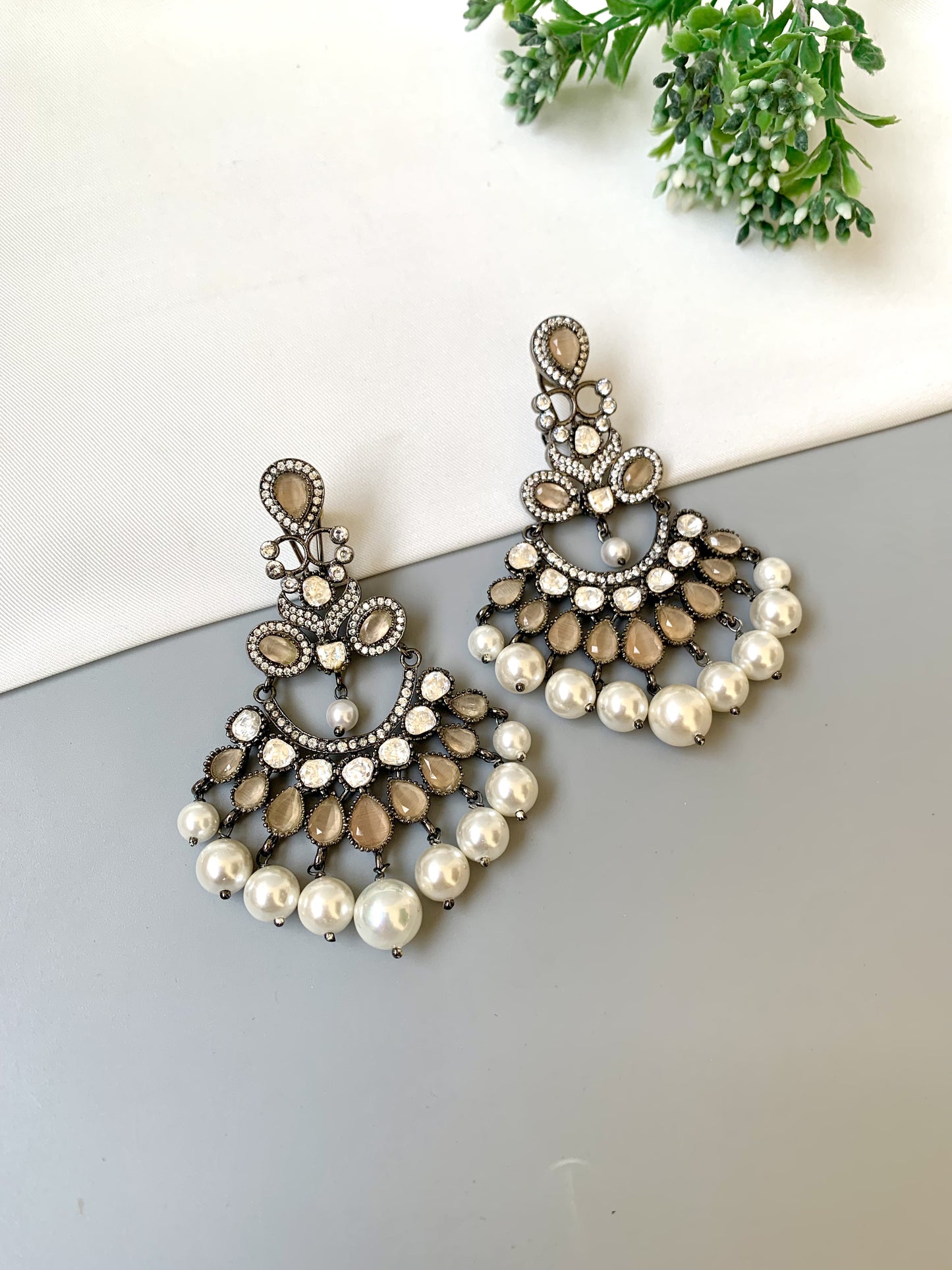 Suhani handcrafted signature earrings in rhodium oxidized finish with polki kundan, onyx and pearls