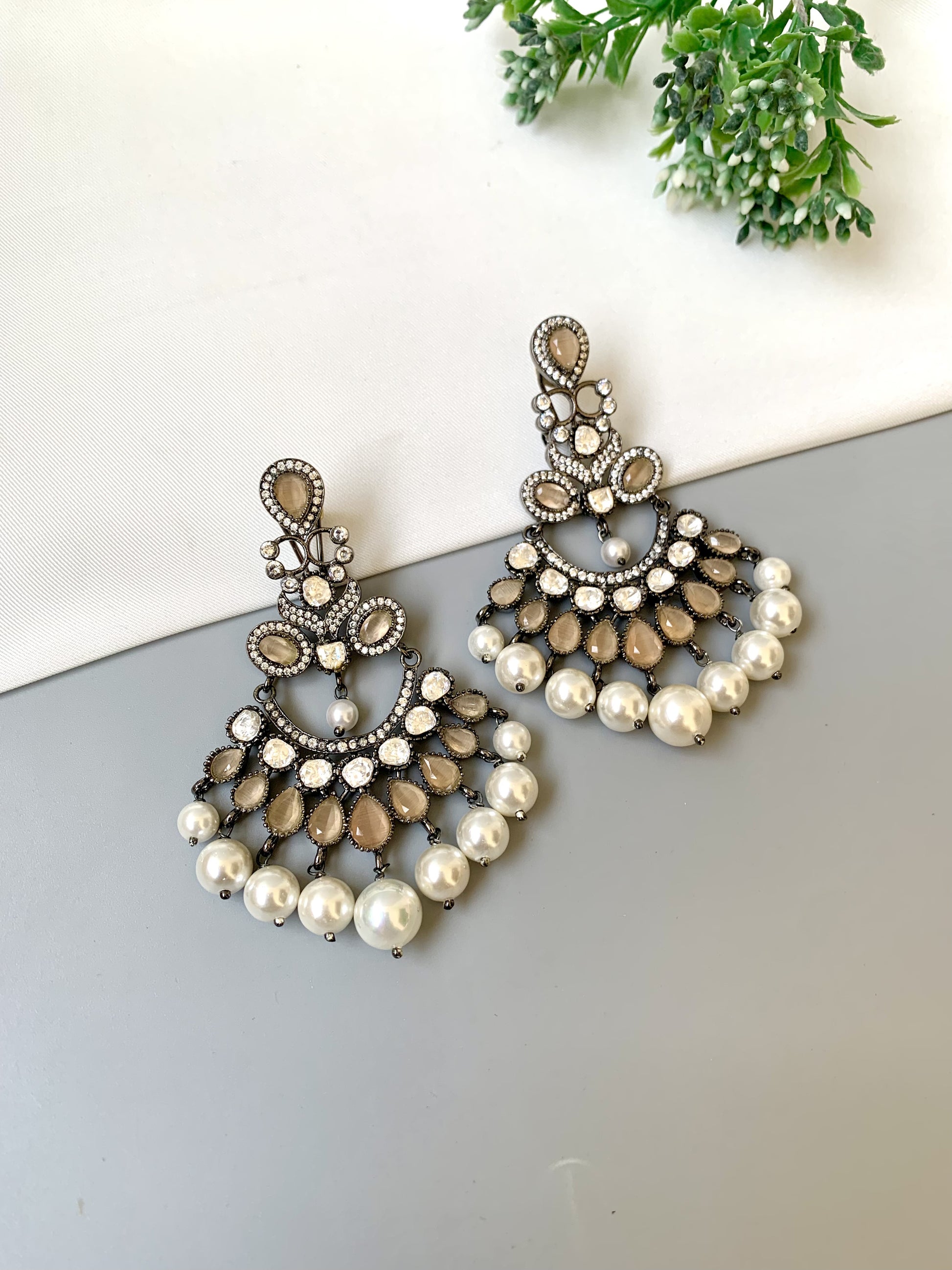 Suhani handcrafted signature earrings in rhodium oxidized finish with polki kundan, onyx and pearls