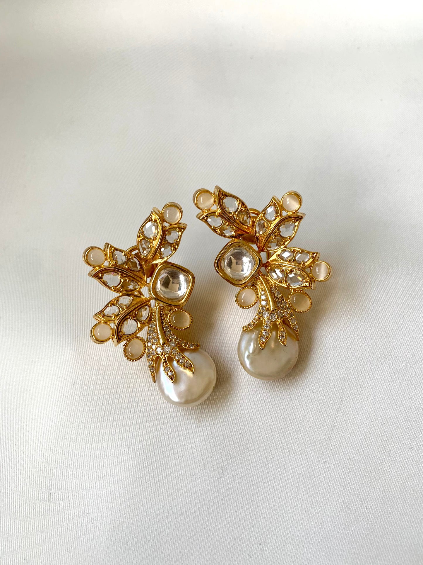 Sundar handcrafted designer earrings with baroque pearls, polki kundan and onyx