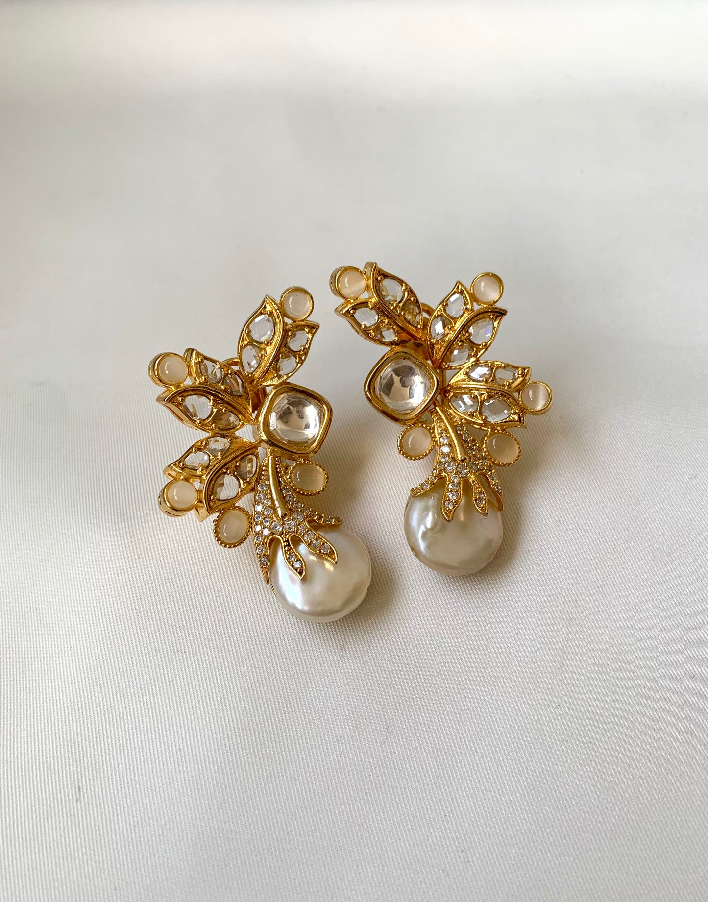 Sundar handcrafted designer earrings with baroque pearls, polki kundan and onyx