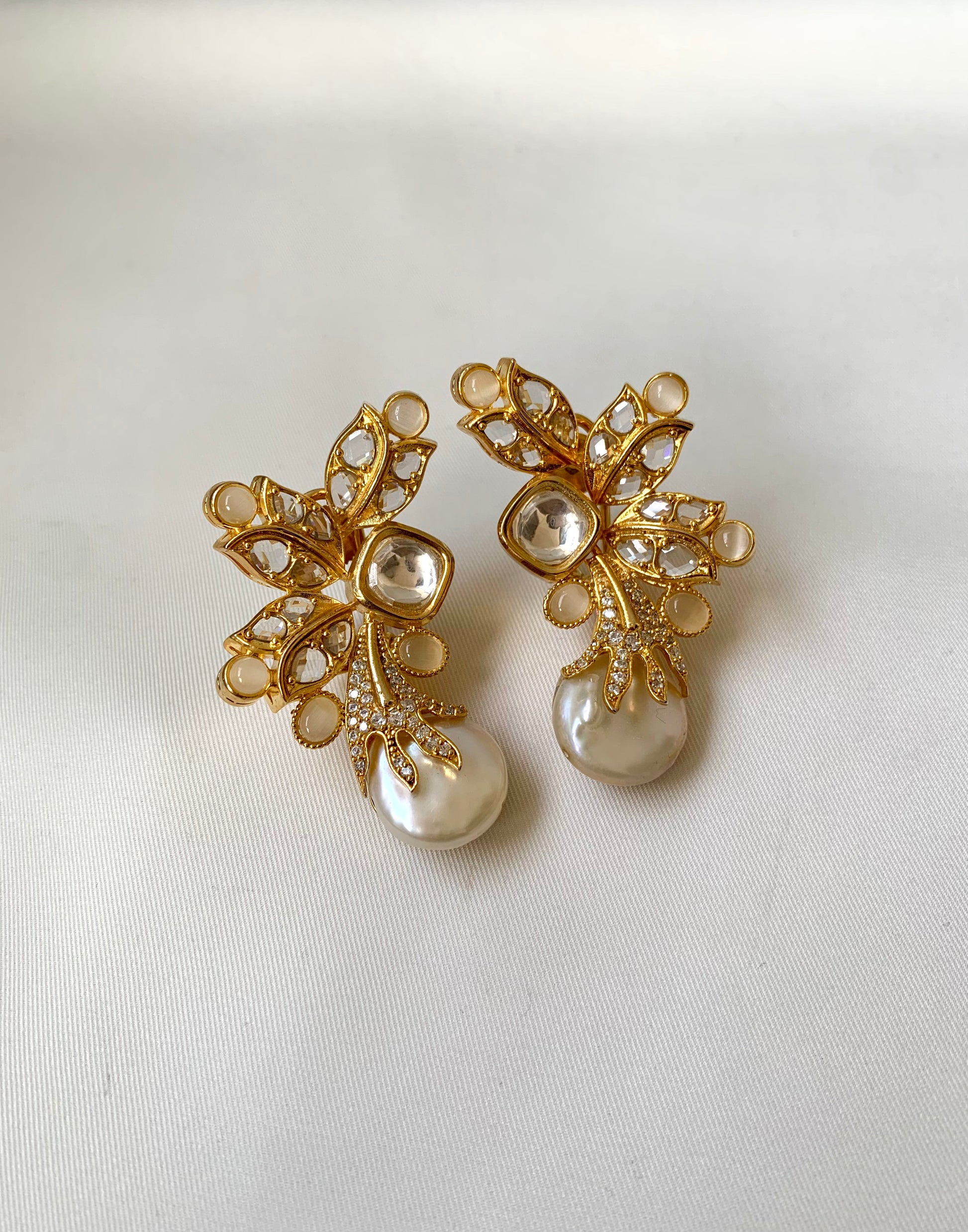 Sundar handcrafted designer earrings with baroque pearls, polki kundan and onyx