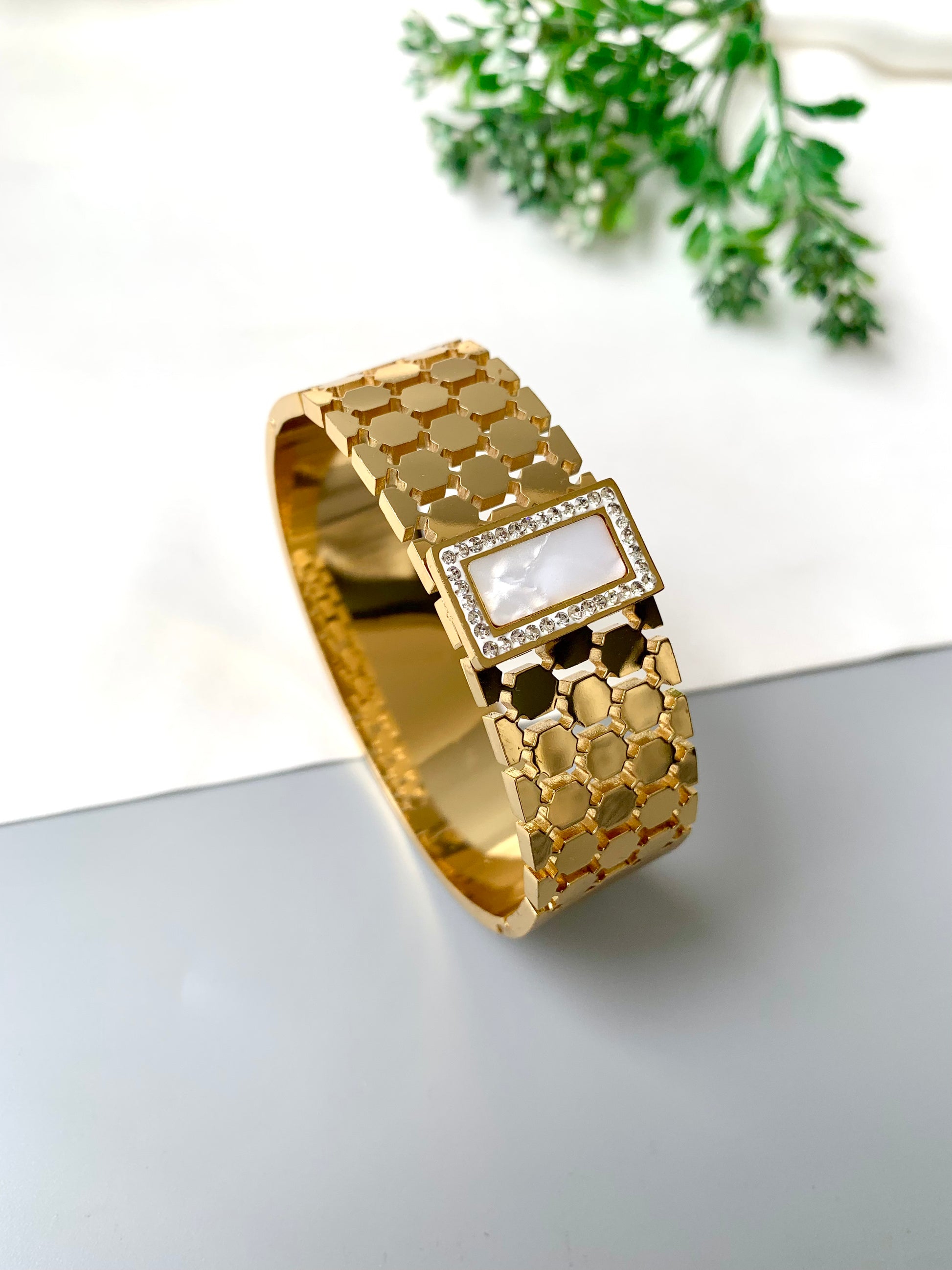 White rectangular mother of pearl bracelet with gold openable band, waterproof and tarnish-proof