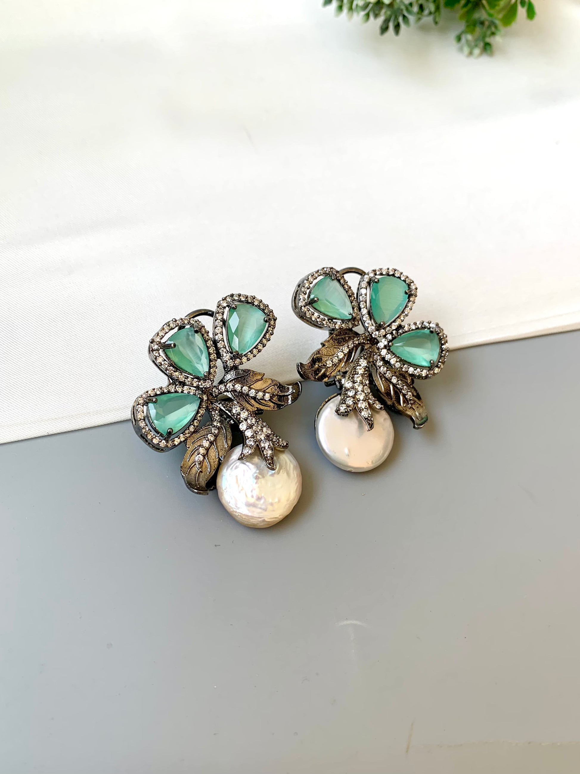 Virasat Mint rhodium plated signature studs with baroque pearls, ruby & American Diamonds