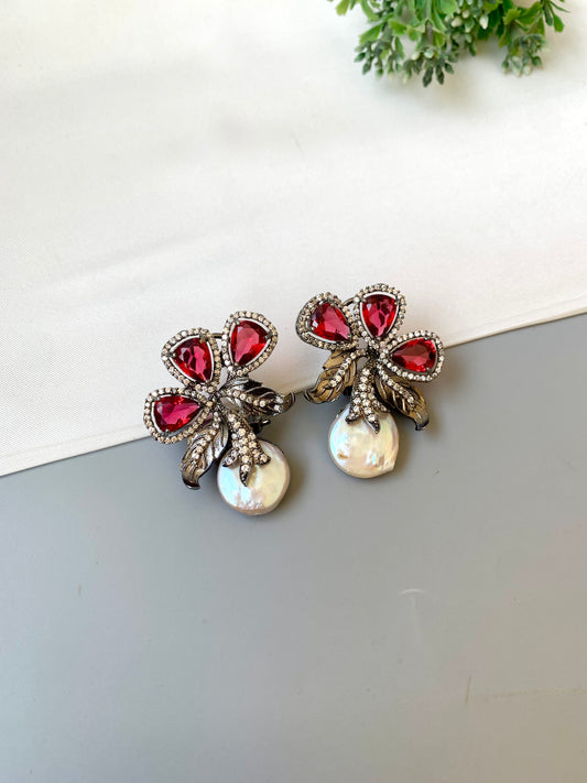 Virasat Ruby rhodium plated signature studs with baroque pearls, ruby & American Diamonds