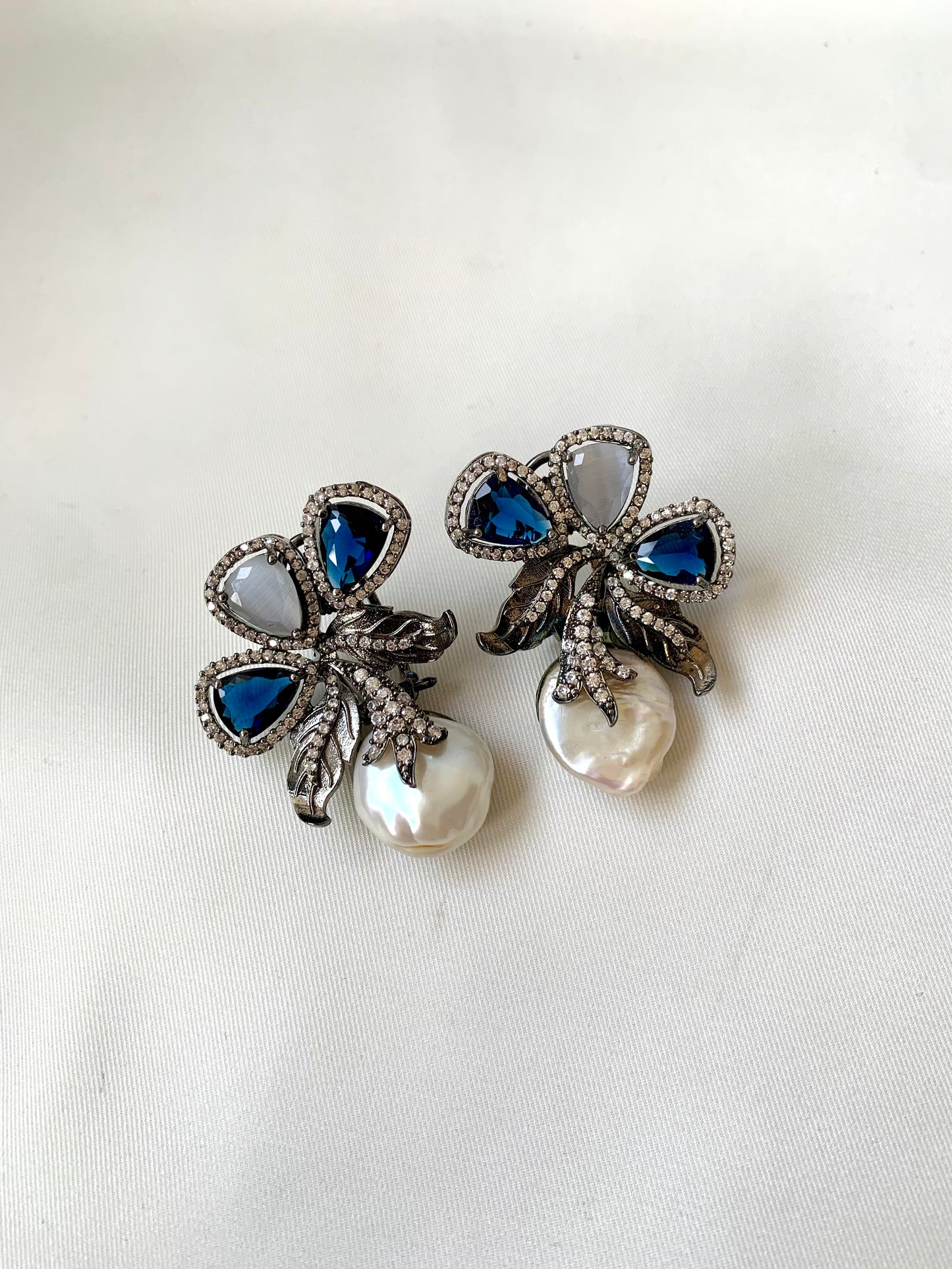 Virasat Sapphire Grey rhodium plated signature studs with baroque pearls, sapphire and grey onyx
