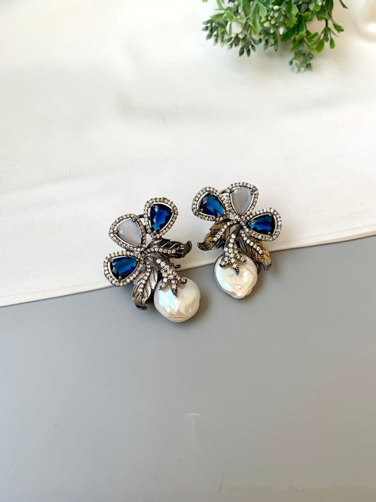 Virasat Sapphire Grey rhodium plated signature studs with baroque pearls, sapphire and grey onyx