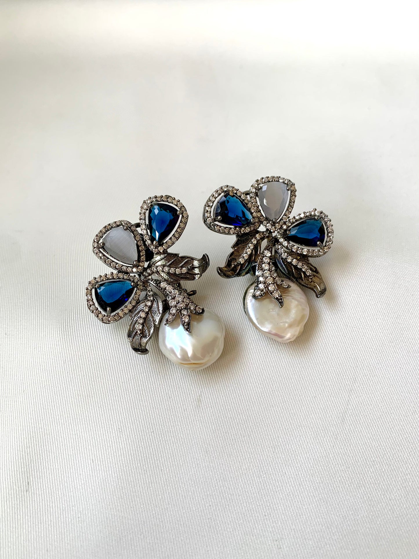 Virasat Sapphire Grey rhodium plated signature studs with baroque pearls, sapphire and grey onyx