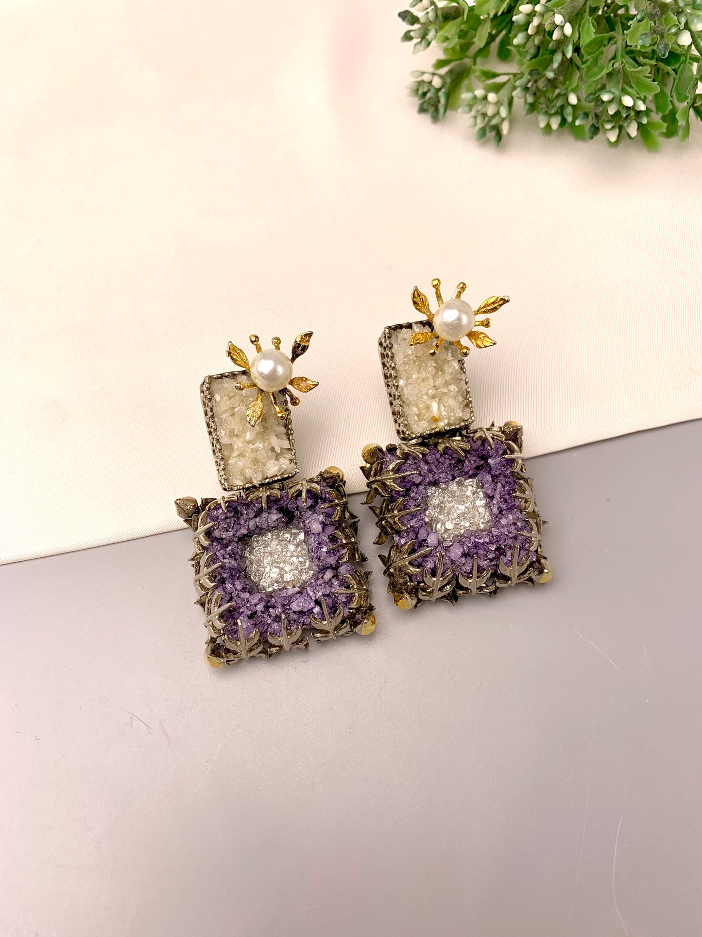 Yorkabel handcrafted earrings with American Diamonds and semi-precious natural gemstones, available in 22kt gold plated Ruby and rhodium oxidized Amethyst variants