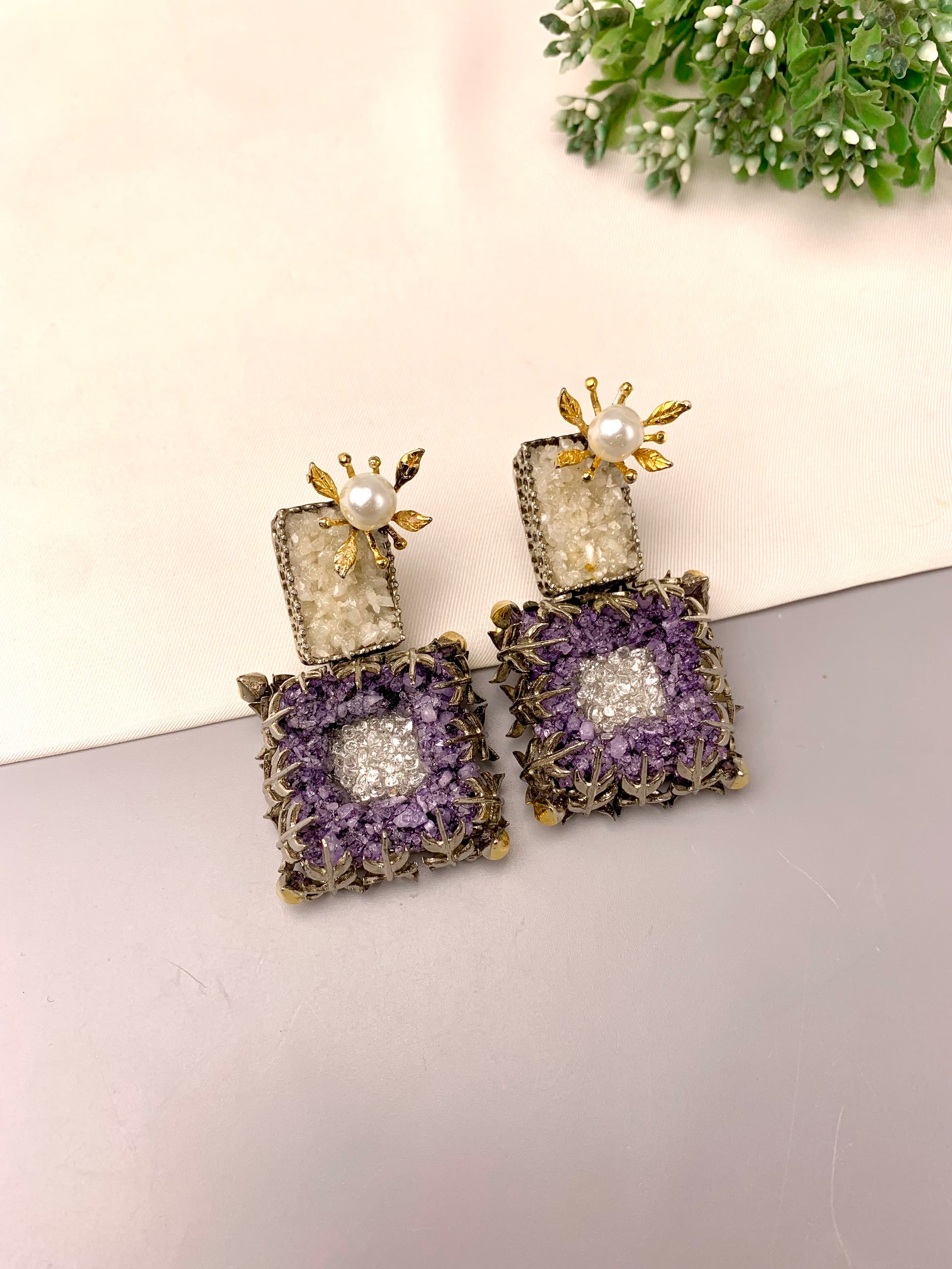 Yorkabel handcrafted earrings with American Diamonds and semi-precious natural gemstones, available in 22kt gold plated Ruby and rhodium oxidized Amethyst variants